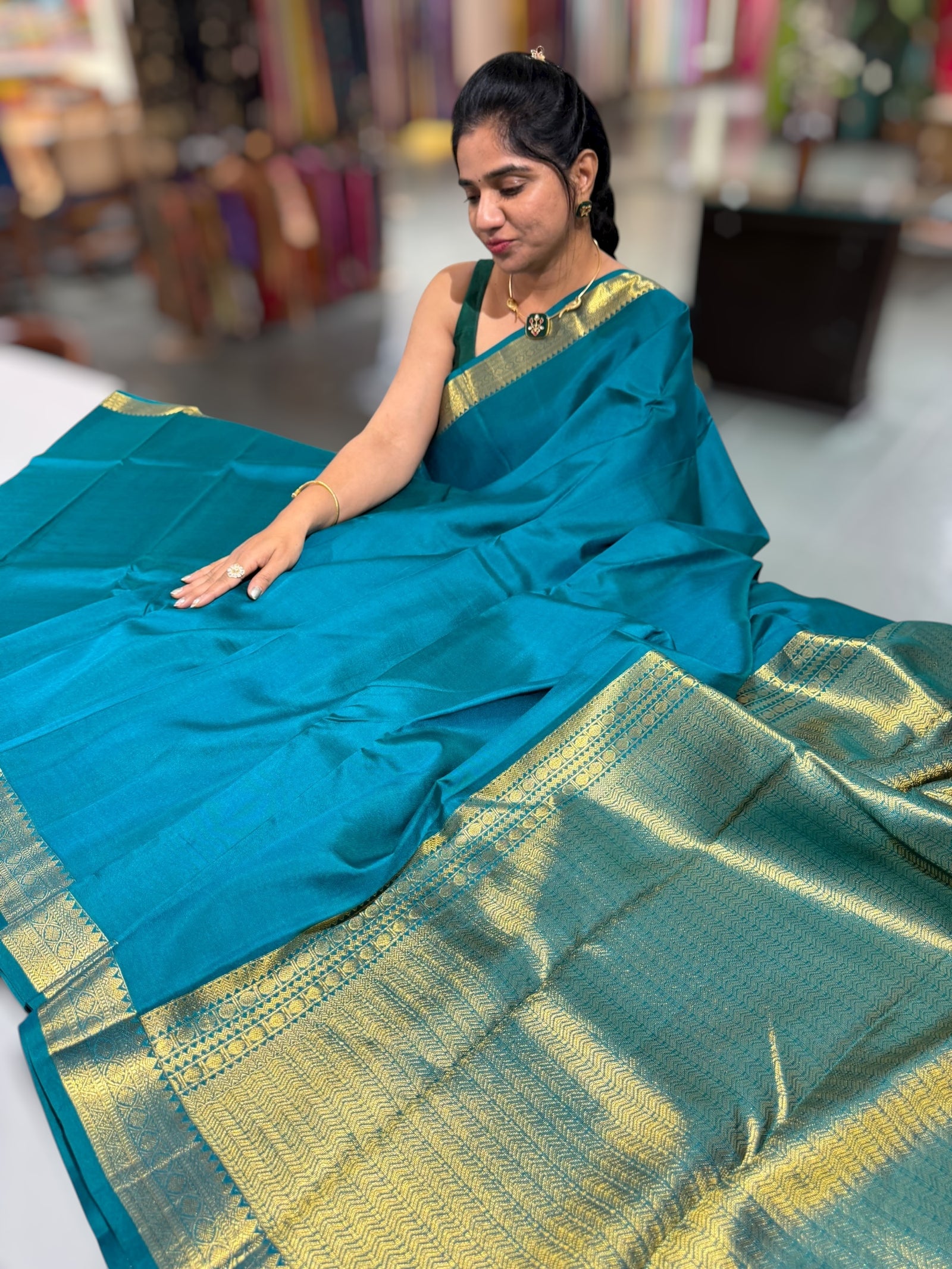 Peacock Green vintage Kanchipuram silk saree with pen kalamkari blouse