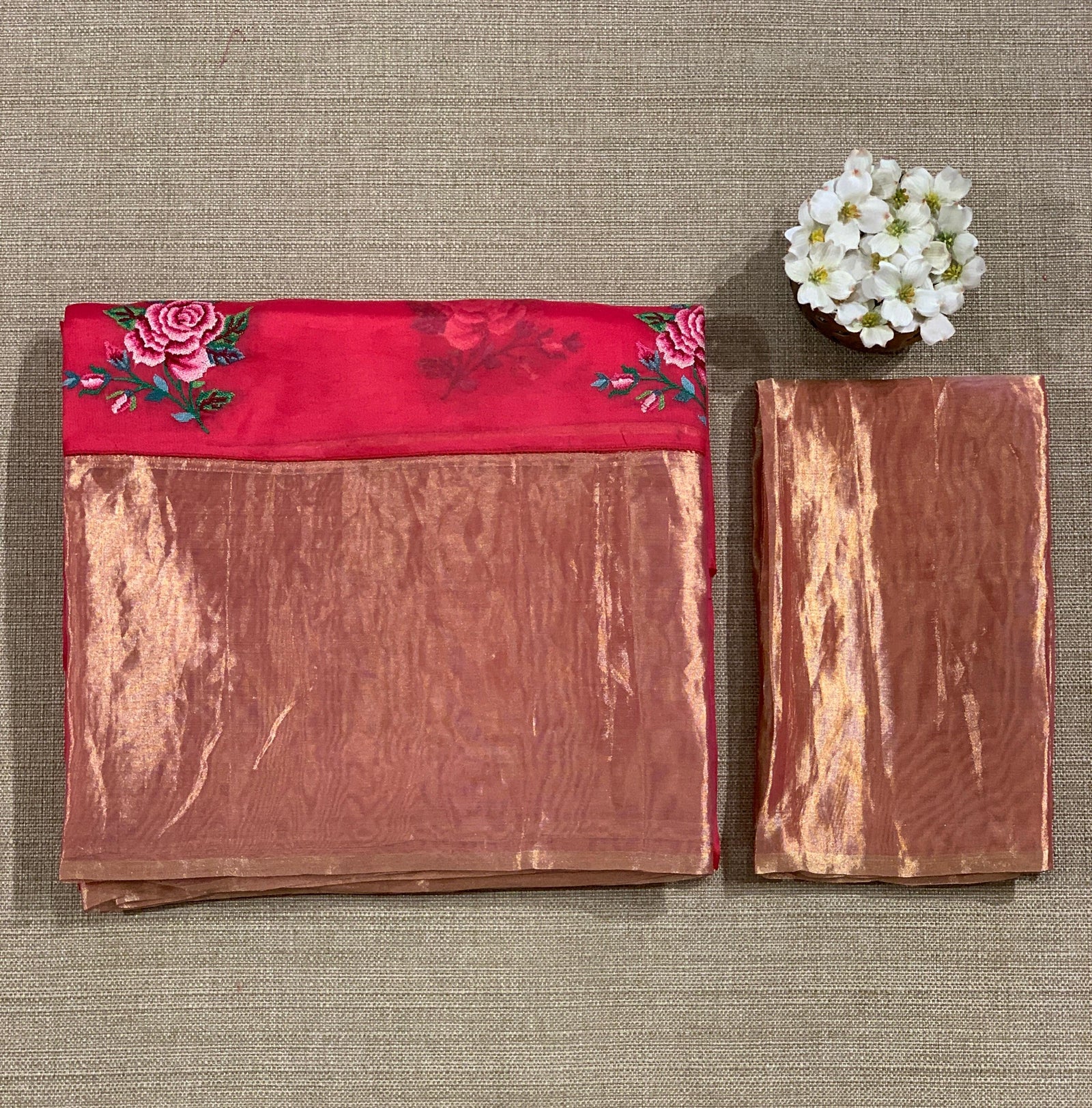 Pinkish Red Organza Saree with pure Tissue Border