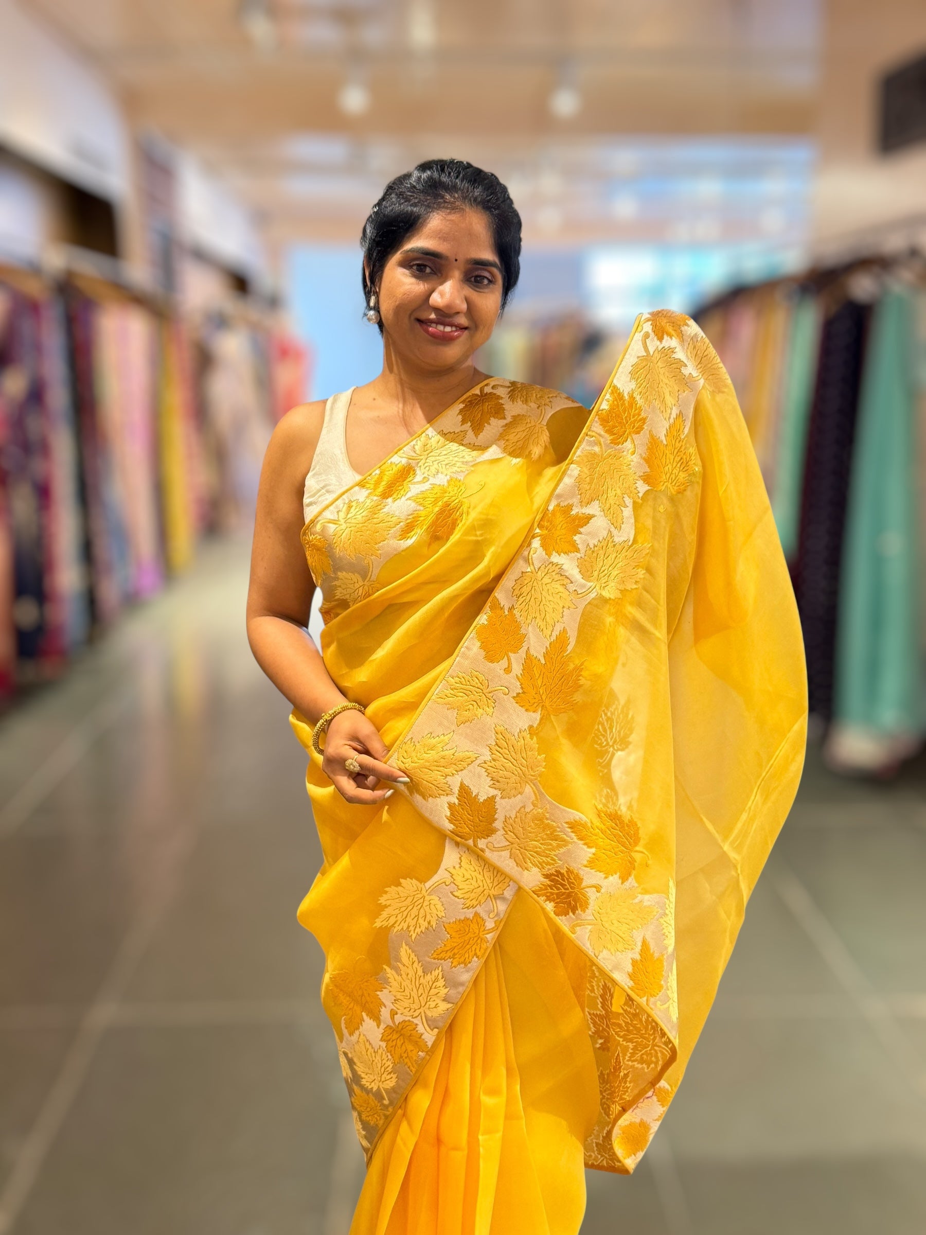 Yellow Organza Saree with Stunning Leaf Embroidered Border