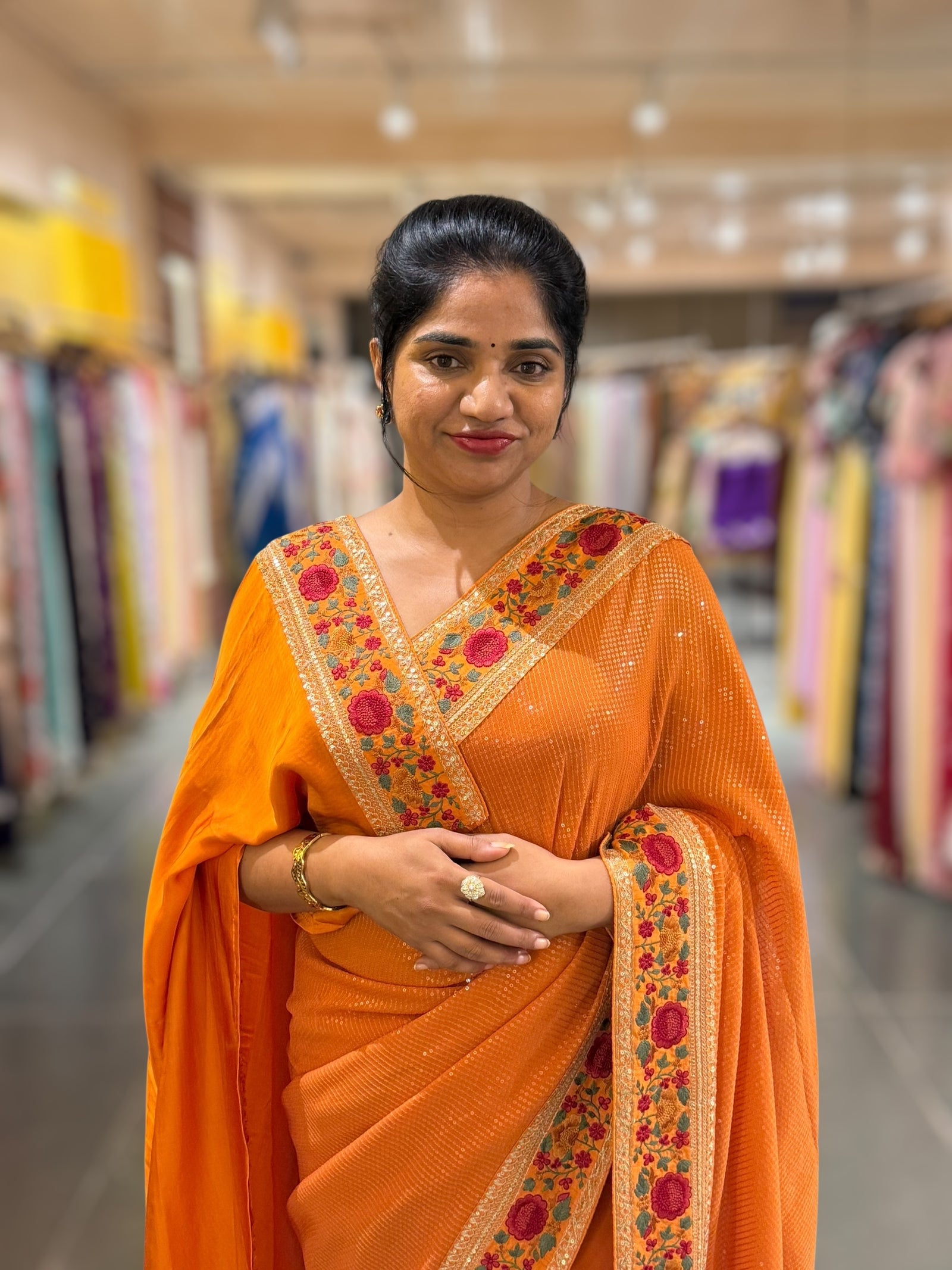Orange Georgette sequnce Saree with Sabyasachi borders