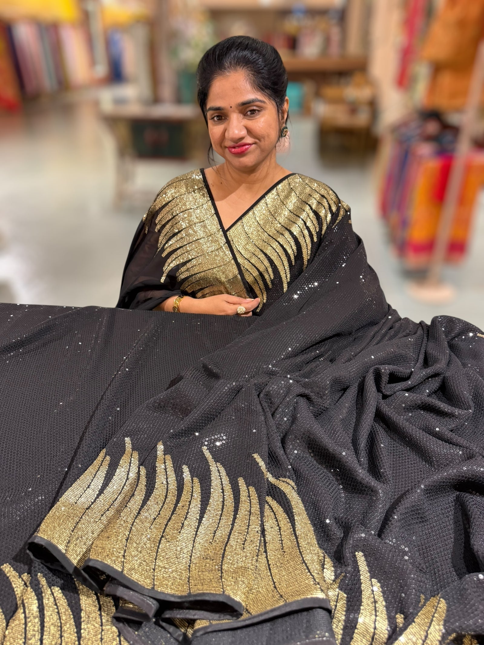 Black Georgette Saree with stunning Gold embroidered Border