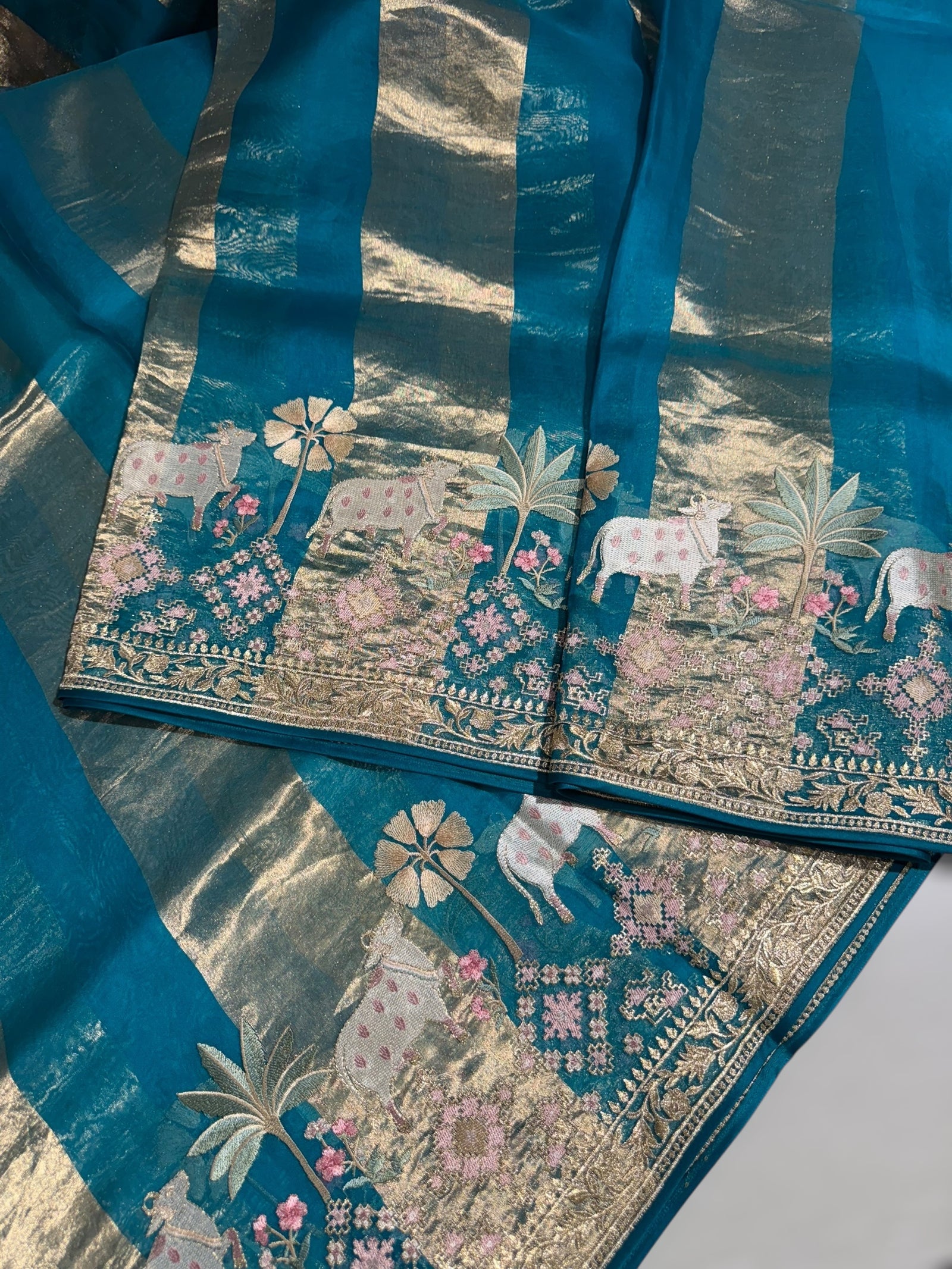 Peacock Blue Kora Tissue Stripes Saree With Jamdani  & Pichwai embroidered Border