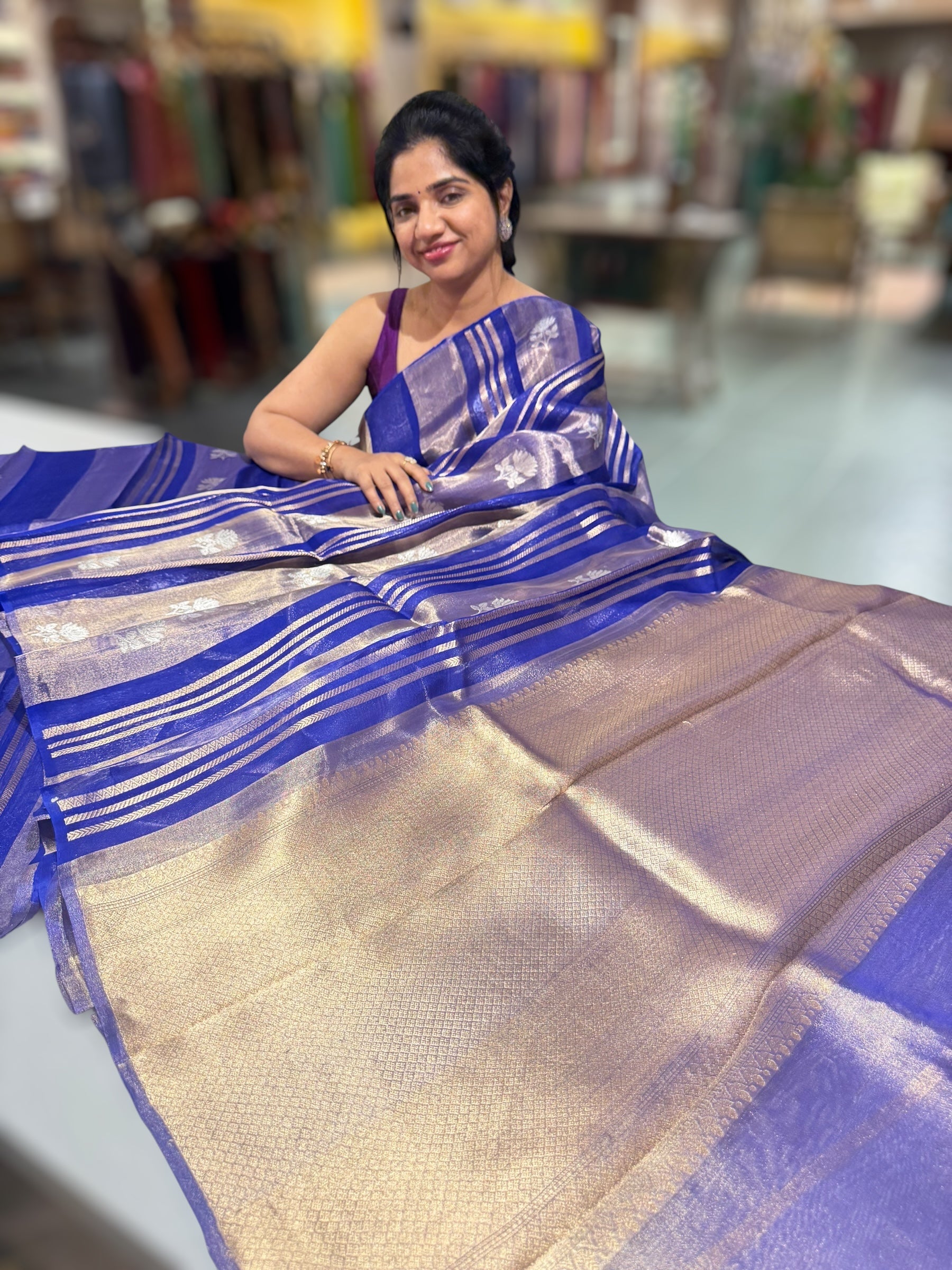 Royal Blue Banarasi Handloom Kora Tissue Stripes with allover kaduwa woven lotus  motifs .