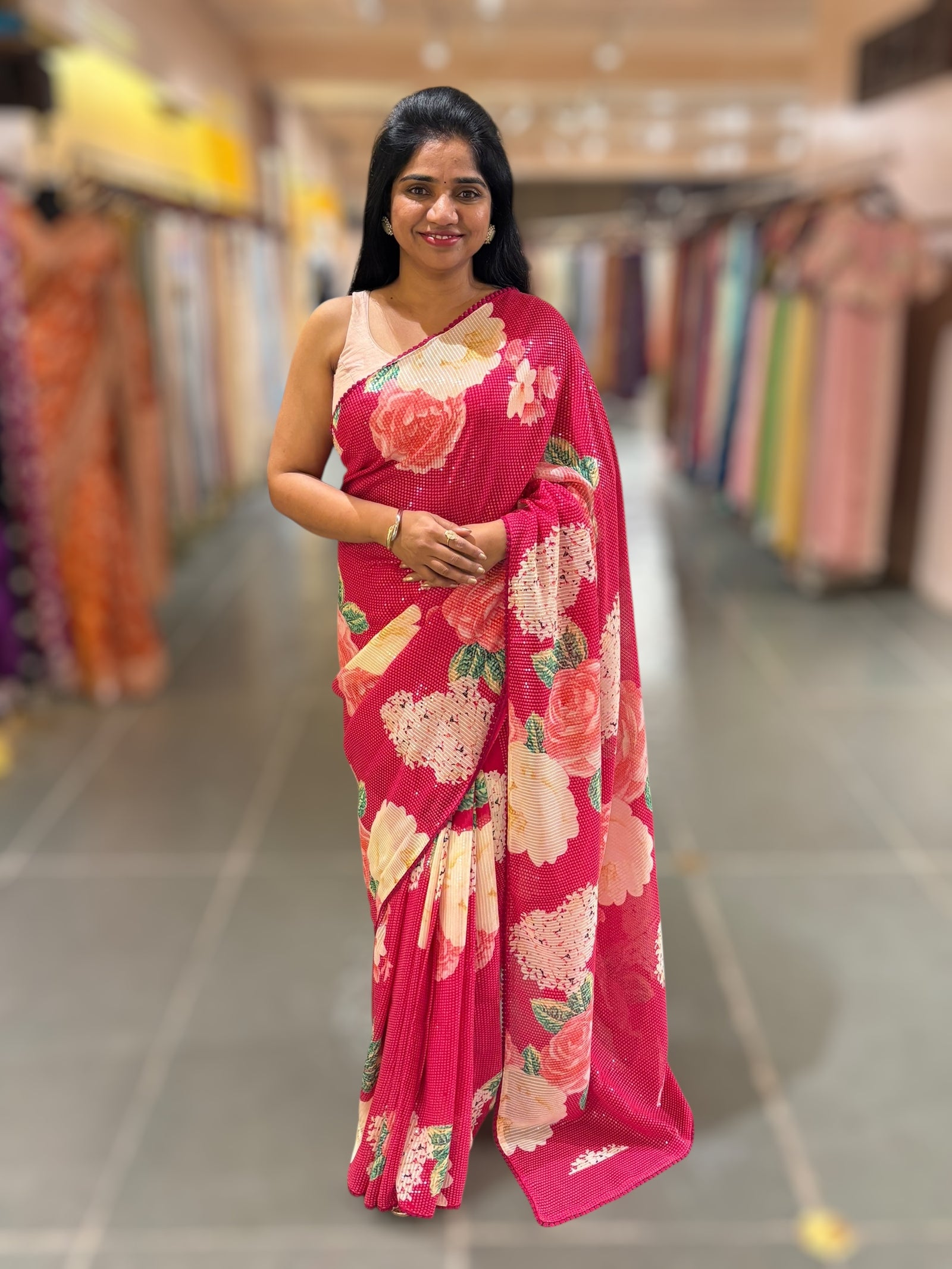 Reddish Pink georgette sequence saree with statement floral print
