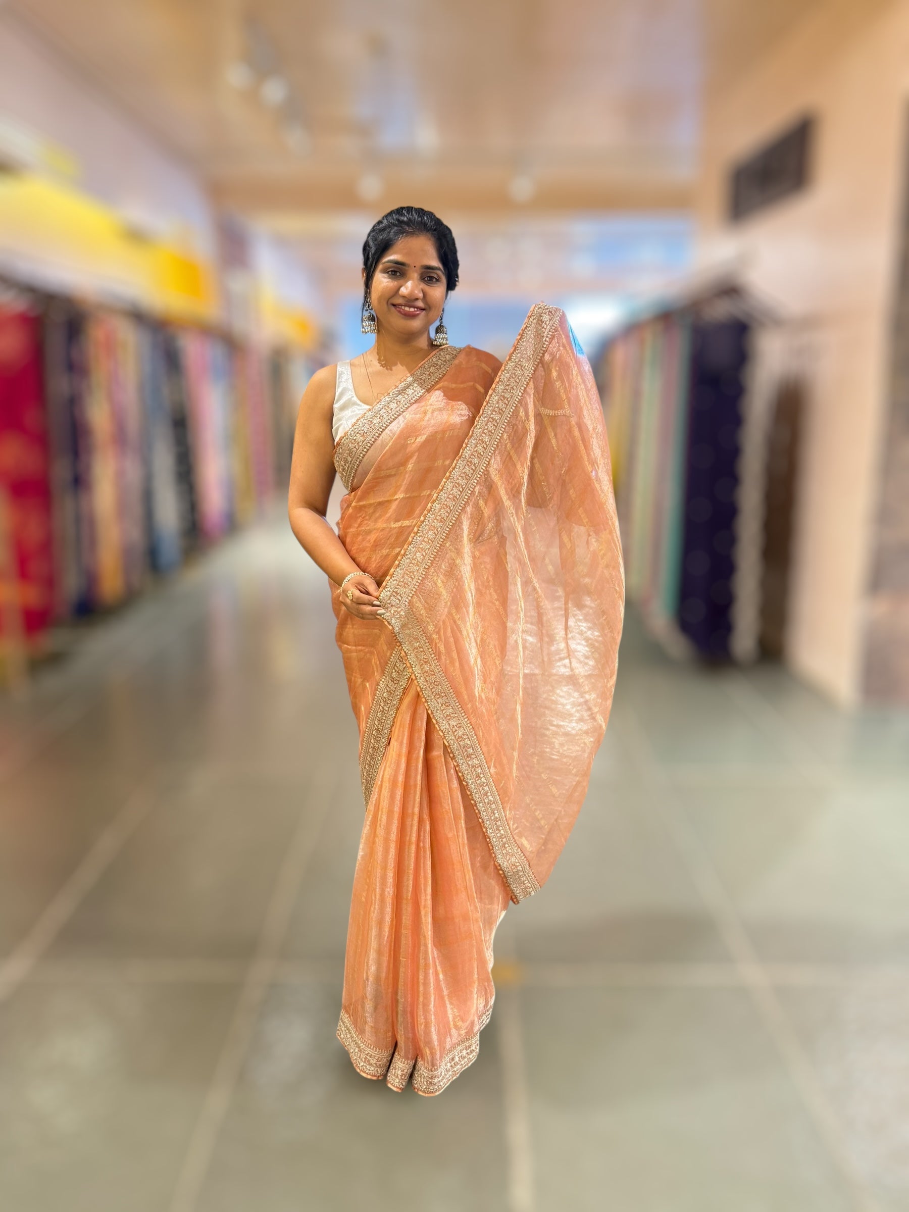 Peach Banarasi Tissue checks Saree with Sabyasachi Borders