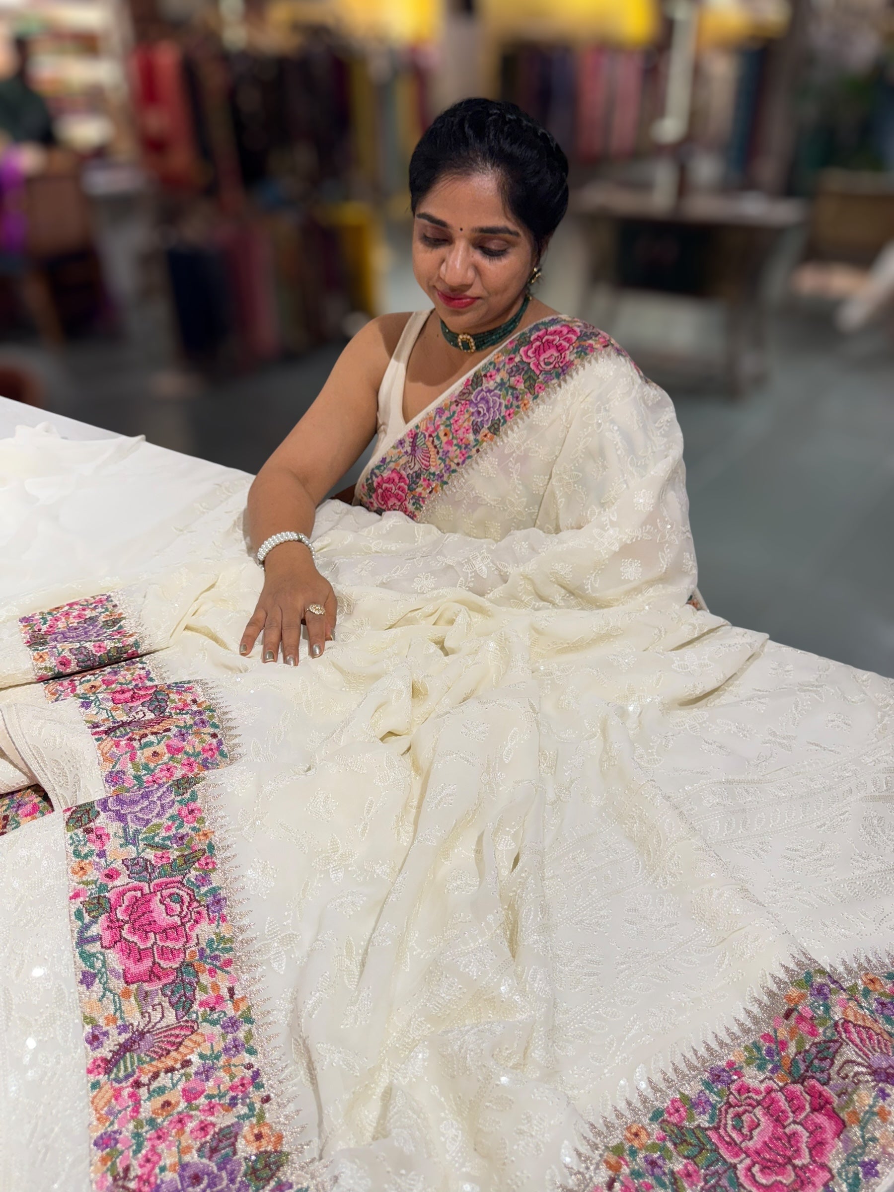 Halfwhite Georgette Saree with allover Chikankari Embroidery and Petite Point border