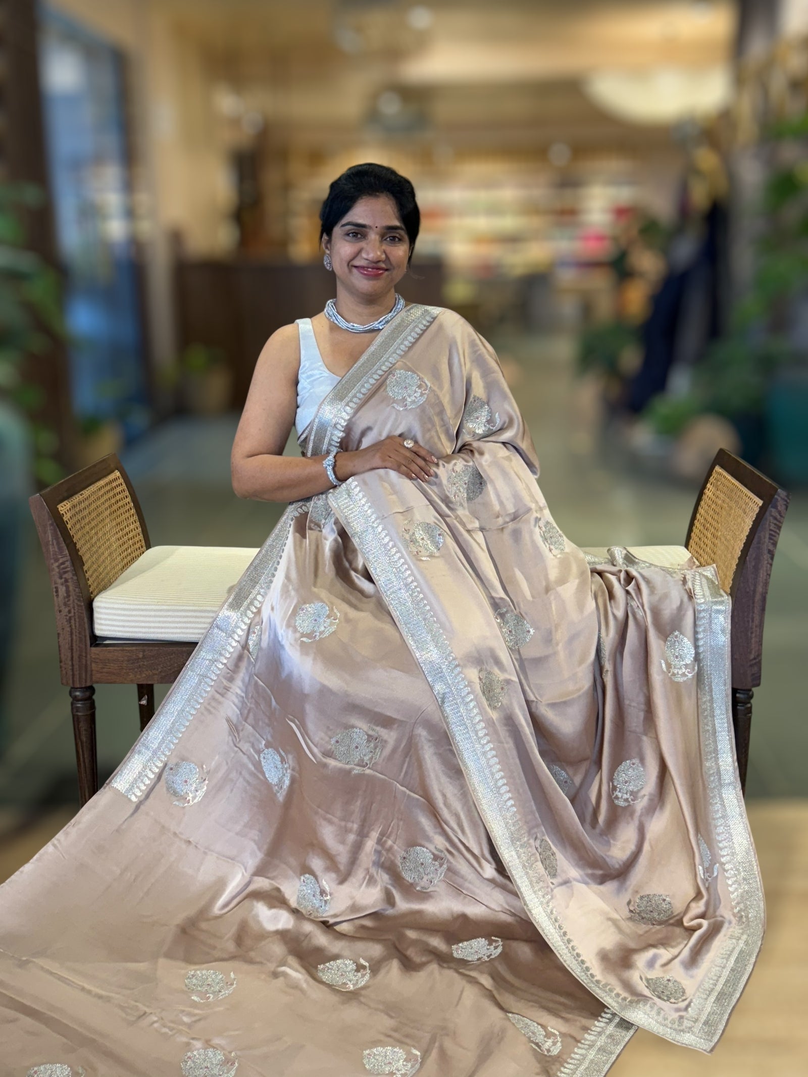 Nude Satin Saree with Embroidery.