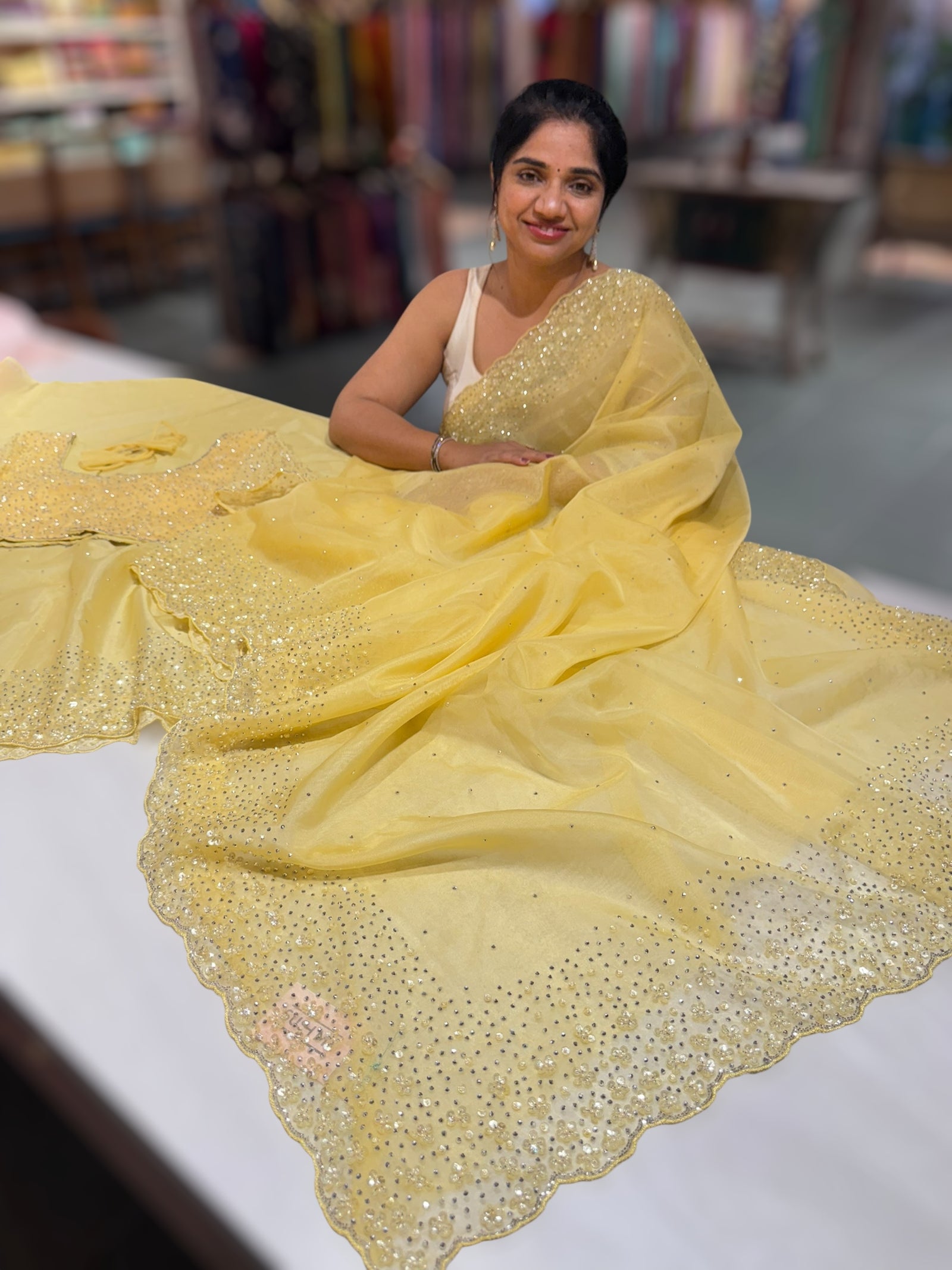 Pastel yellow Organza handwork saree with ready to wear blouse