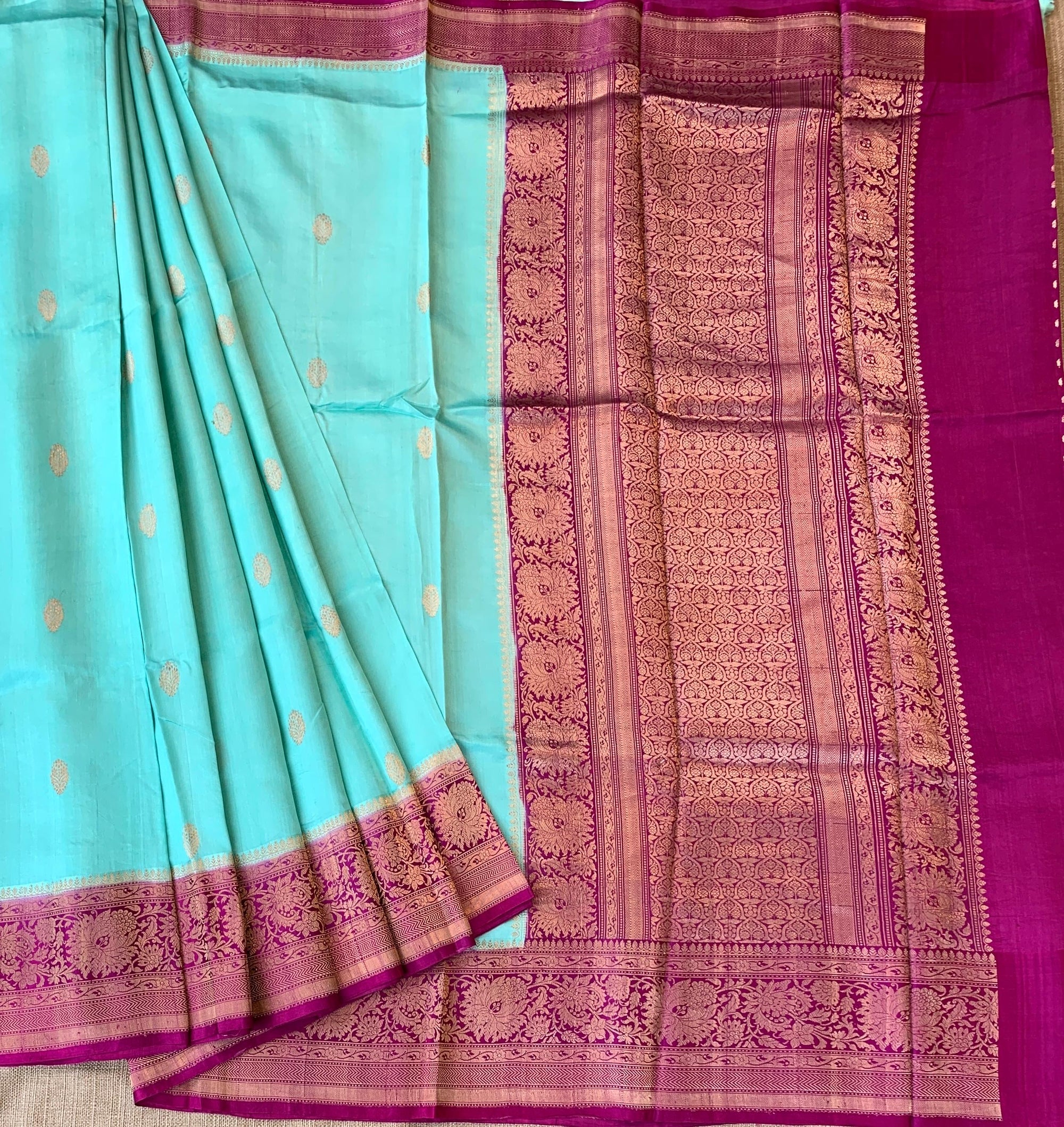 SeaBlue & Majenta Combo Raw Mangoe Silk Saree with heavy weaving mashru border & kaduwa woven motifs.