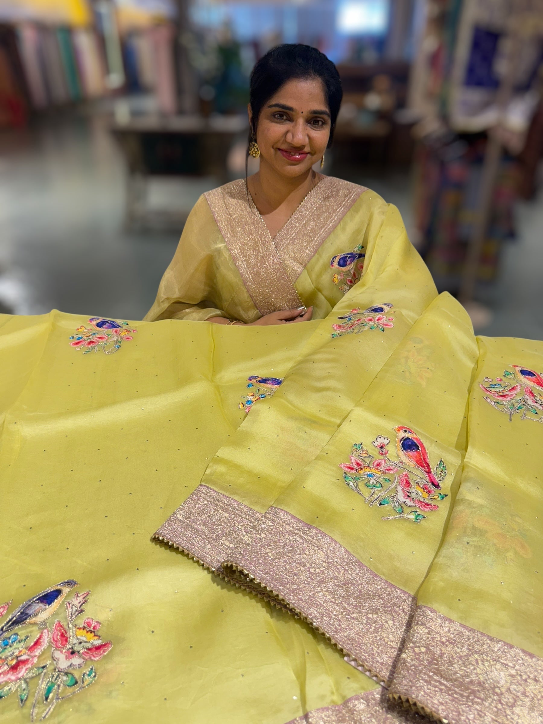 Lime yellow Pure Organza Saree with banarasi pitawork border and bird applique motifs allover the saree
