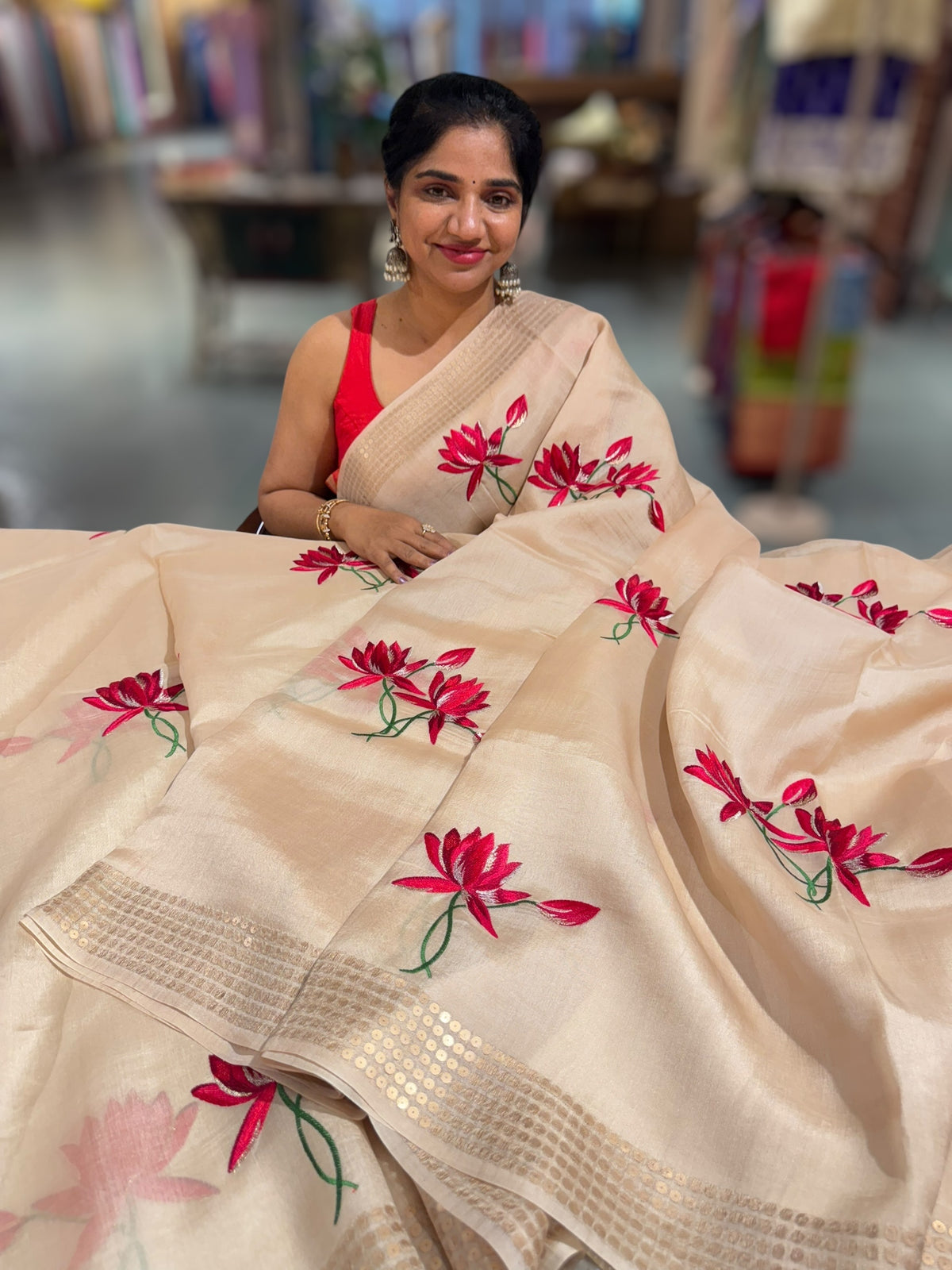 Ivory pure handloom tussar byloom saree with lotus embroidered bunch motifs