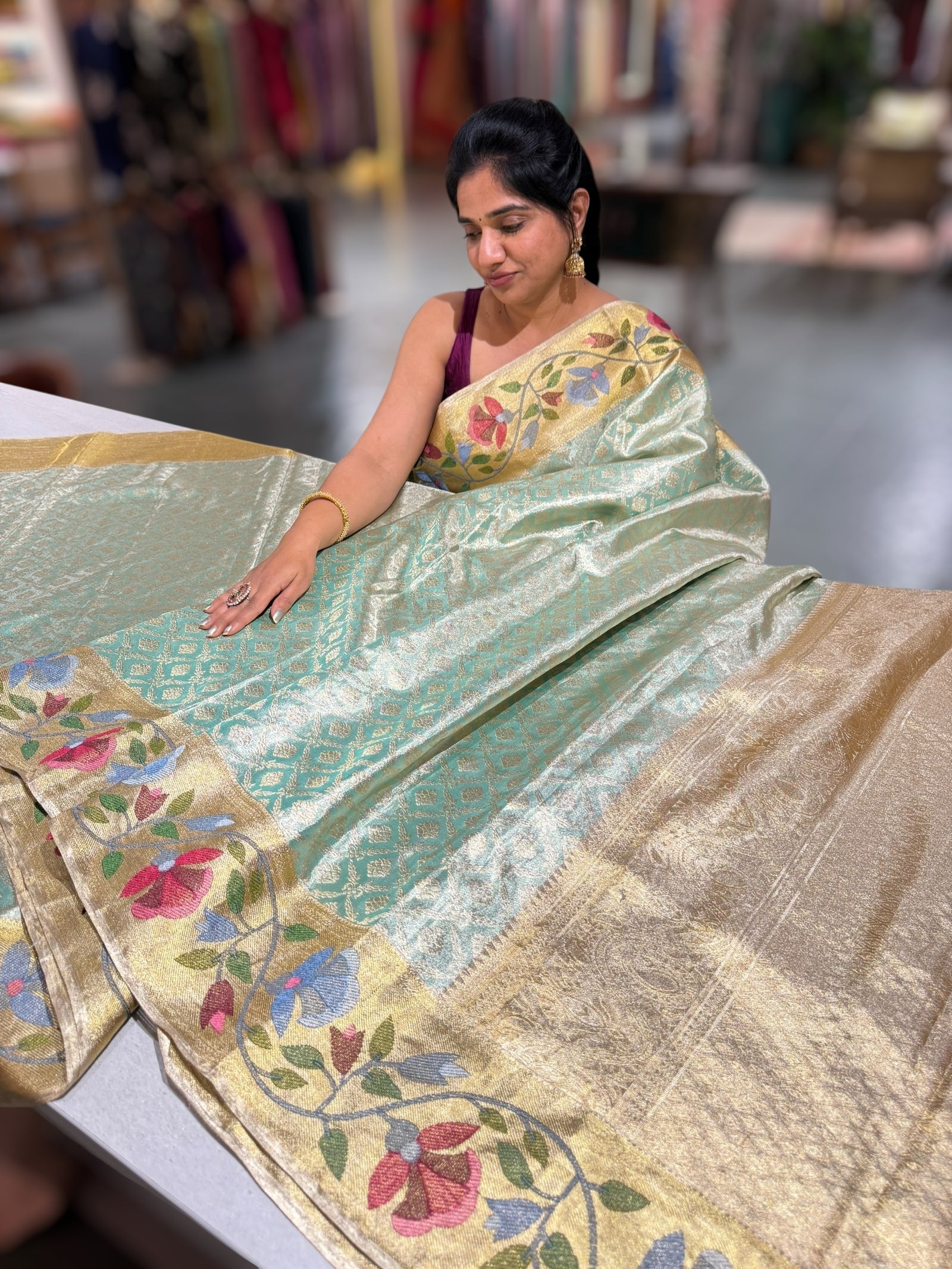 Sea Green Kanchi Tissue Brocade Saree With jamdani inspired embroidery.
