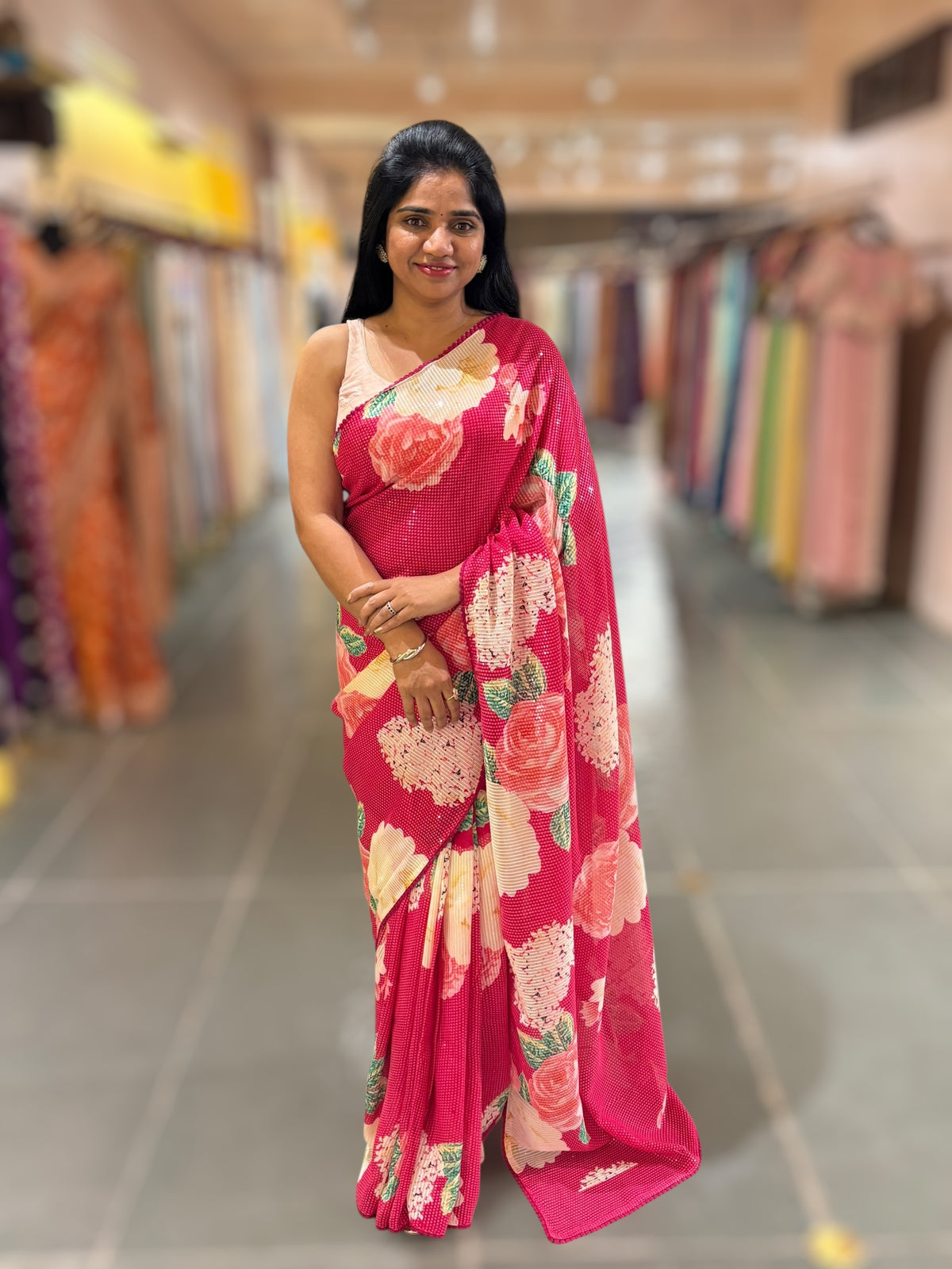 Reddish Pink georgette sequence saree with statement floral print