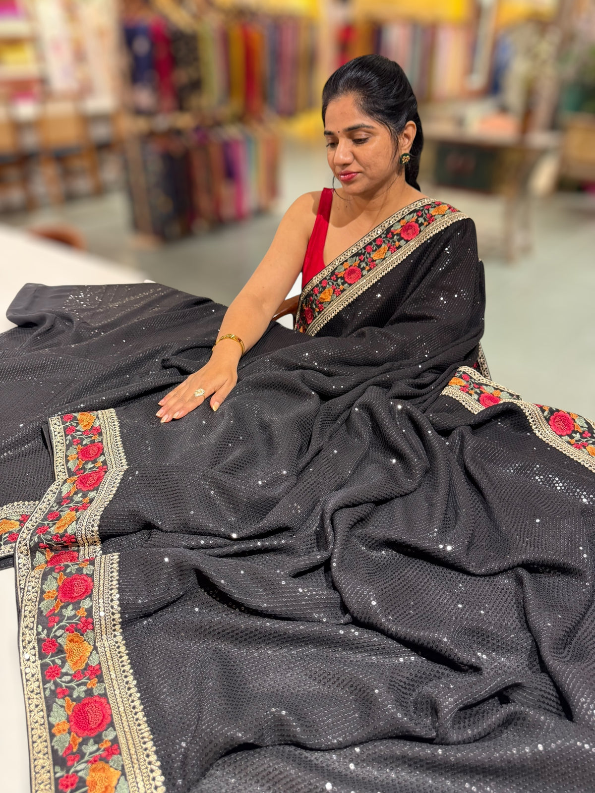 Black Georgette sequnce Saree with Sabyasachi borders and Blouse