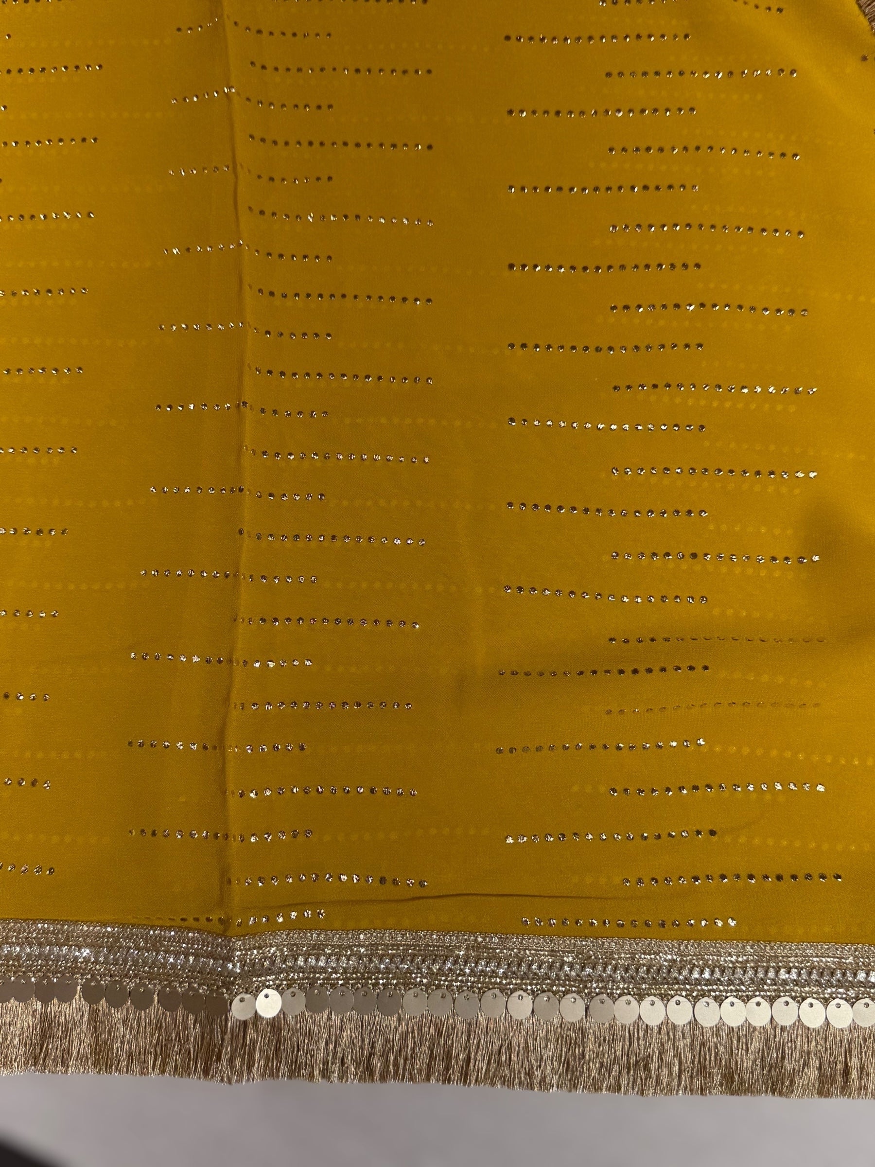 Yellow light Georgette Saree with stick on Badla in stripes pattern and kiran Lace