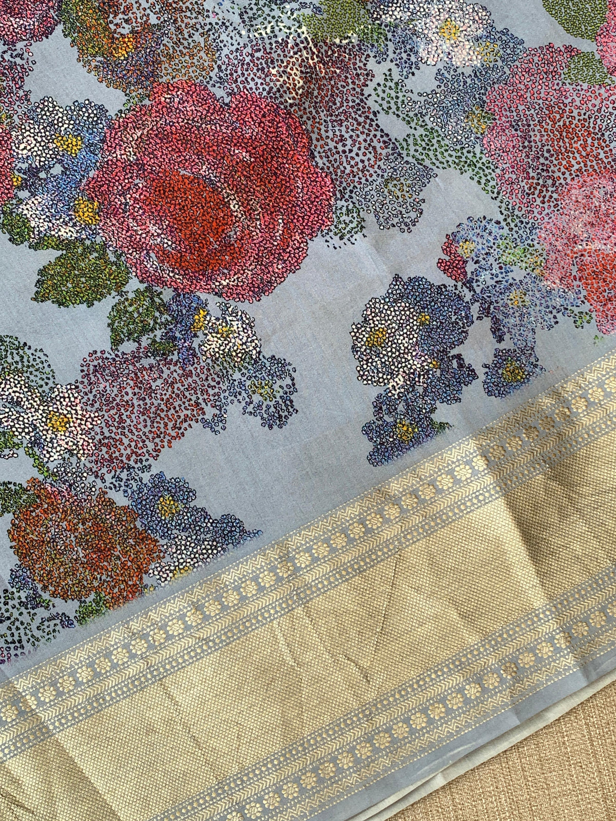 Dusty Blue Pure Handloom Chiniya Silk Saree with stunning Floral Print and zari borders