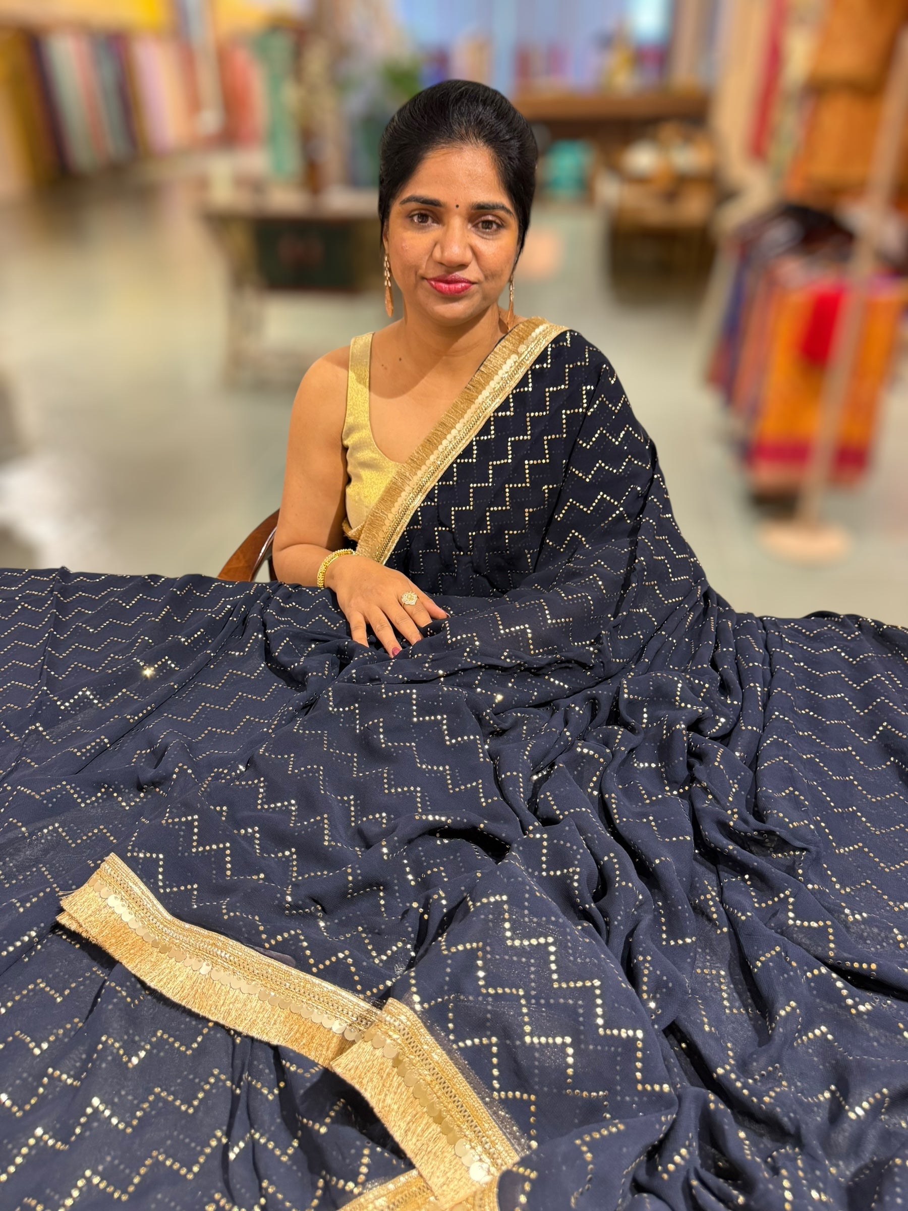 Navy Georgette Saree with stick on Badla in zigzag pattern