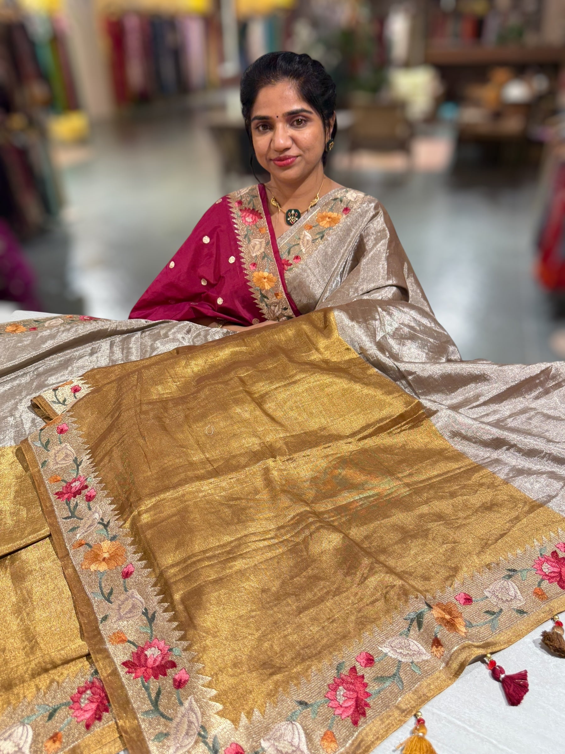 Handloom Tissue Saree with Paithani inspired embroidered border.