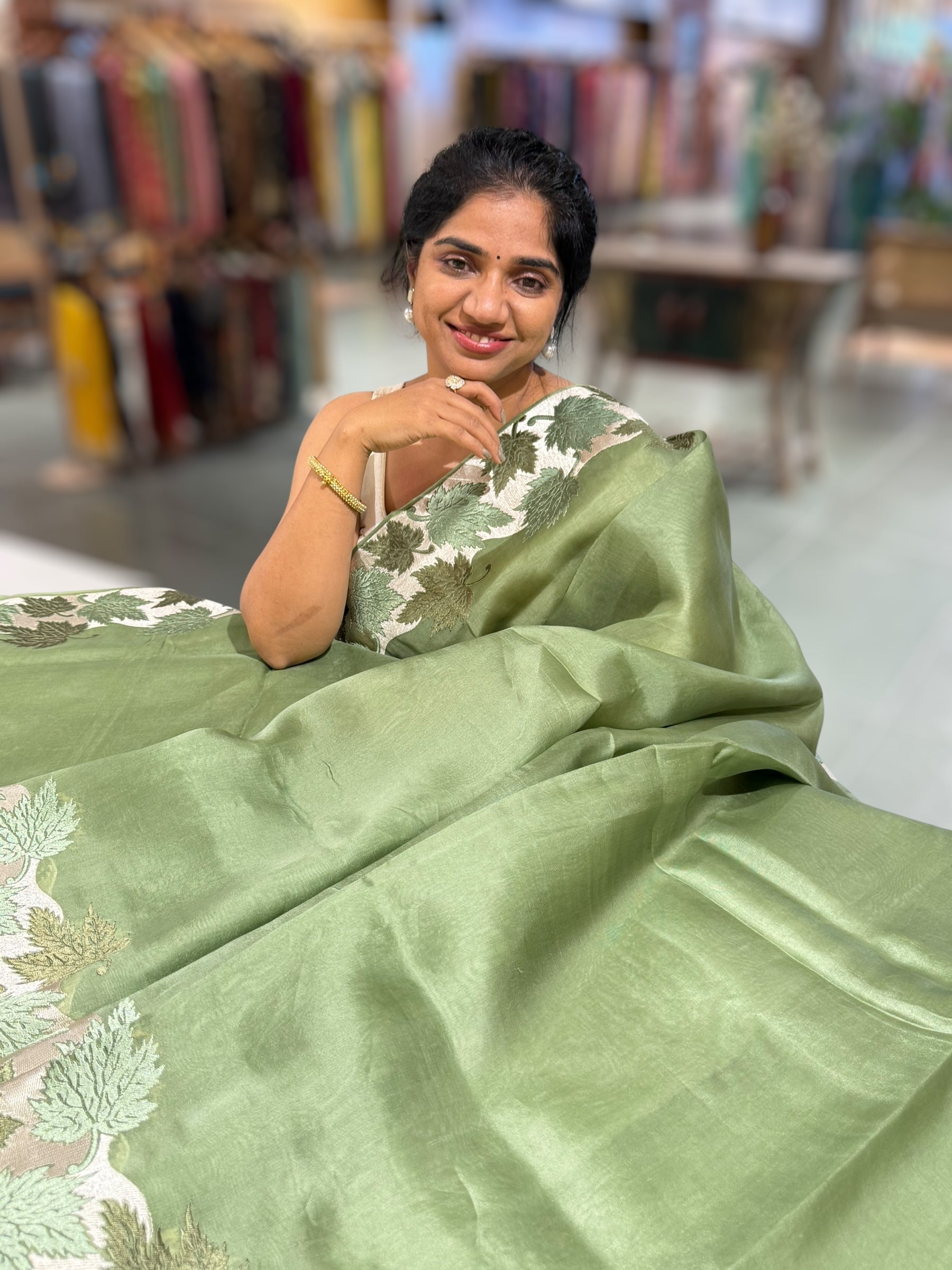 Sage Green Organza Saree with Stunning Leaf Embroidered Border