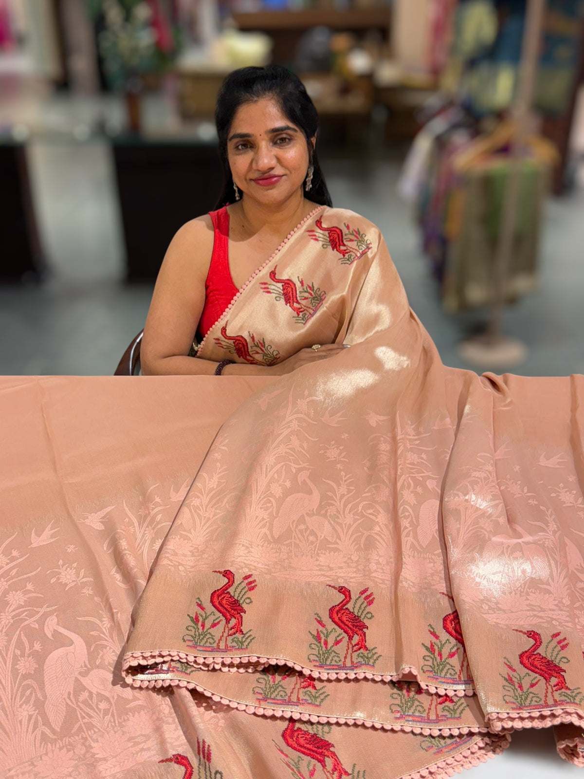 Peach Pink Banarasi Brocade tissue saree with tonchui style weaving & petite point embroidered swan border