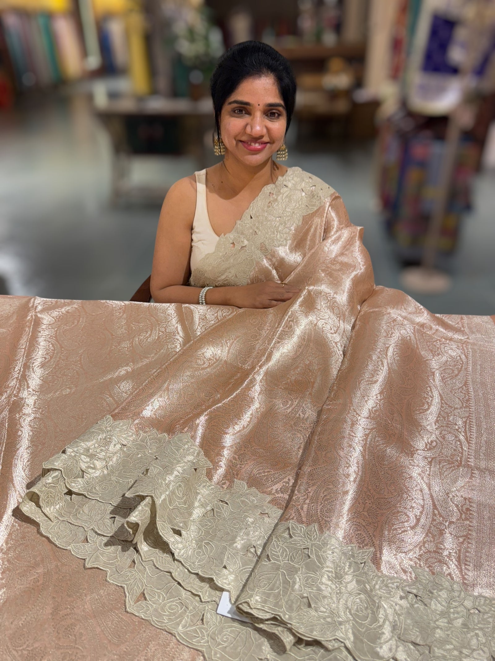 Peach Tissue Brocade allover weaving Saree with Tissue Cutwork Rose Border