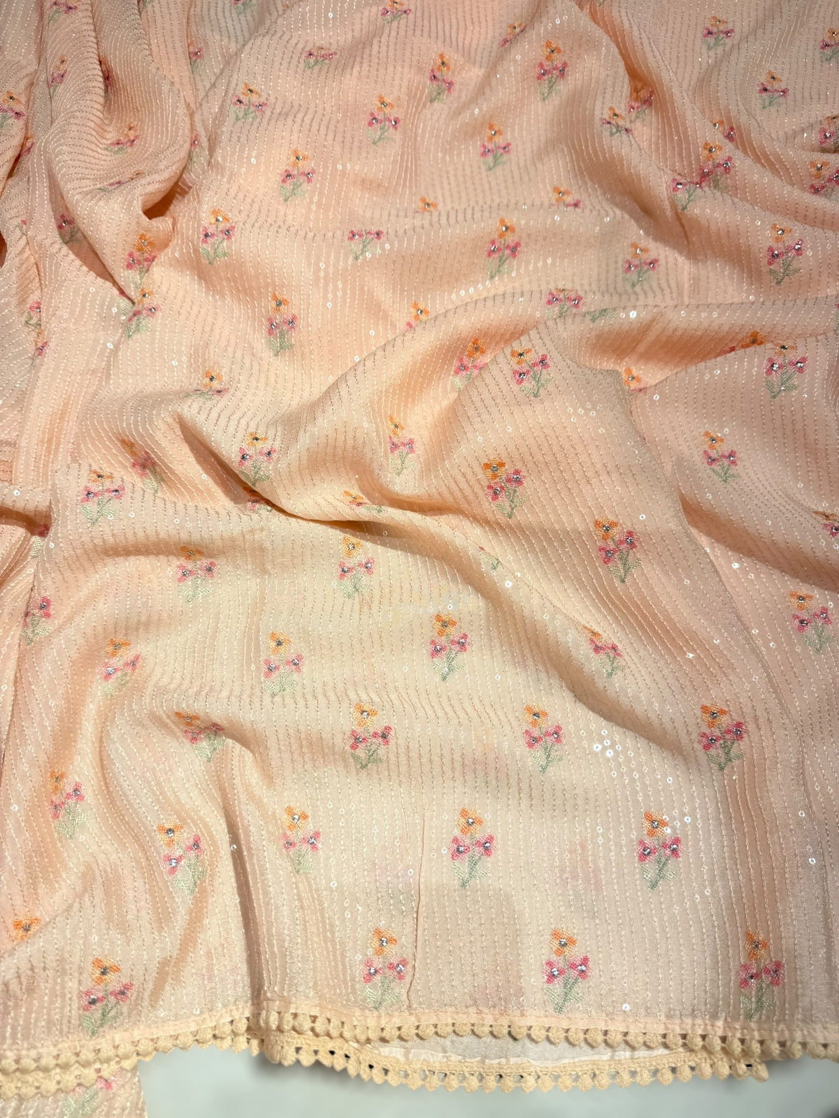 Light peach chiffon saree with embroidery