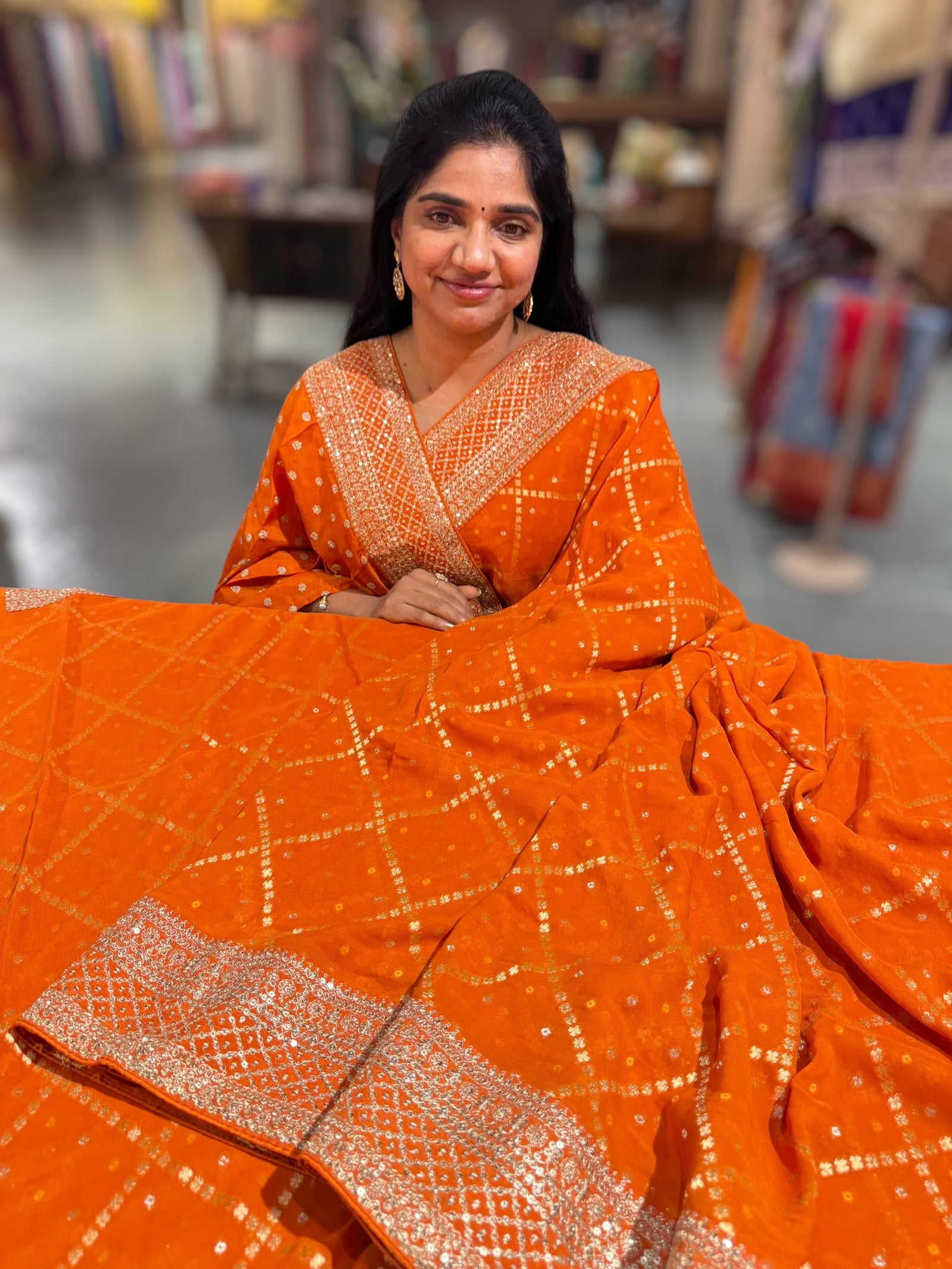 Orange Fancy Banarasi Bandhini georgette saree with sabhyasachi borders and blouse