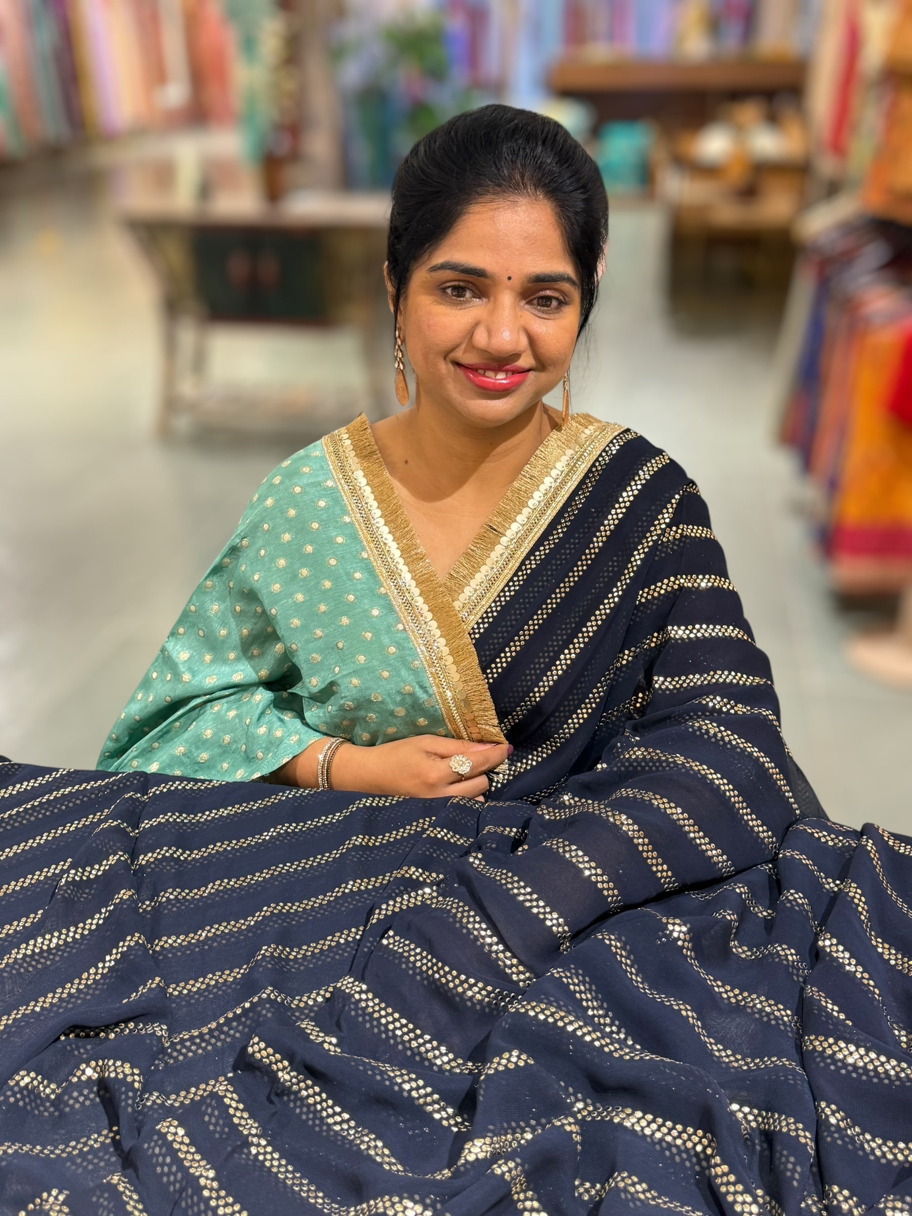 Navy Blue Georgette Saree with stick on Badla in stripes pattern and kiran Lace