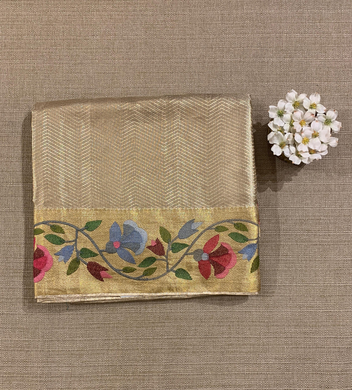 Water Gold Kanchi Tissue Brocade Saree With jamdani inspired embroidery.