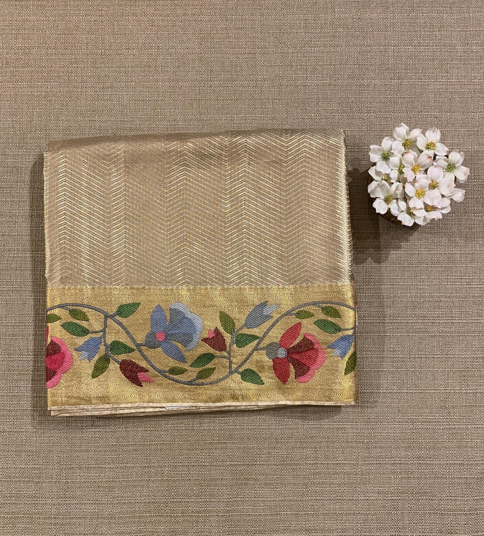 Water Gold Kanchi Tissue Brocade Saree With jamdani inspired embroidery.