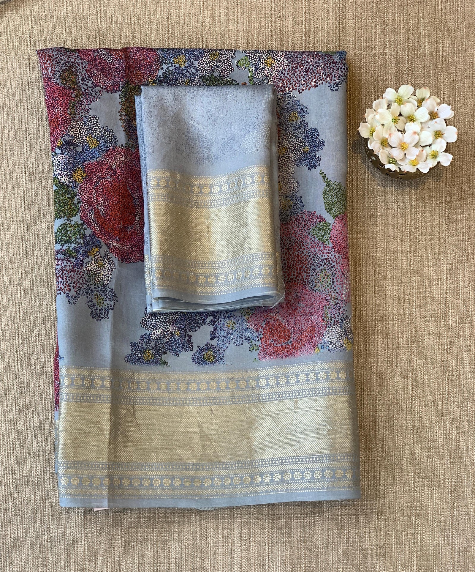 Dusty Blue Pure Handloom Chiniya Silk Saree with stunning Floral Print and zari borders