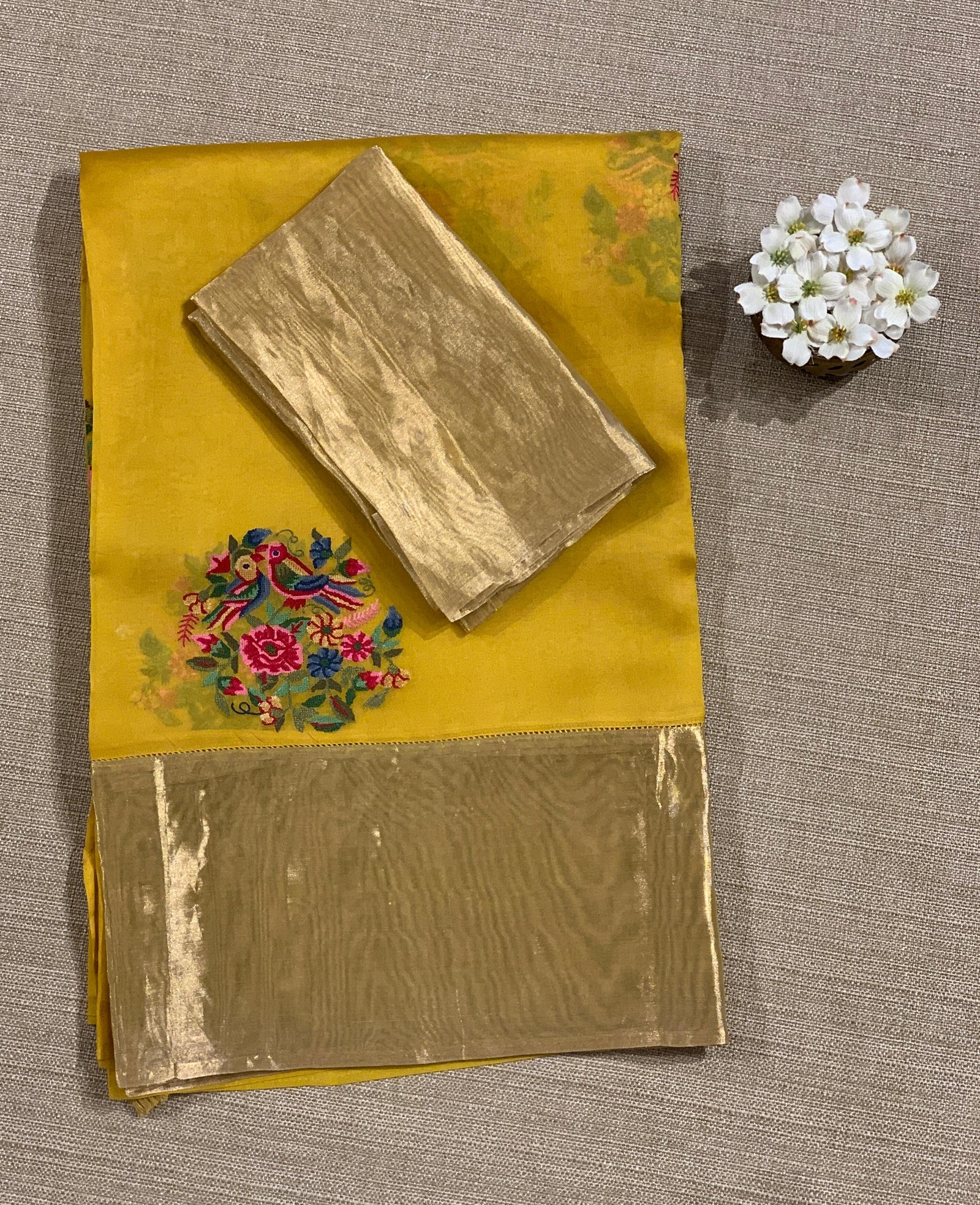 Yellow Organza Saree with pure Tissue Border