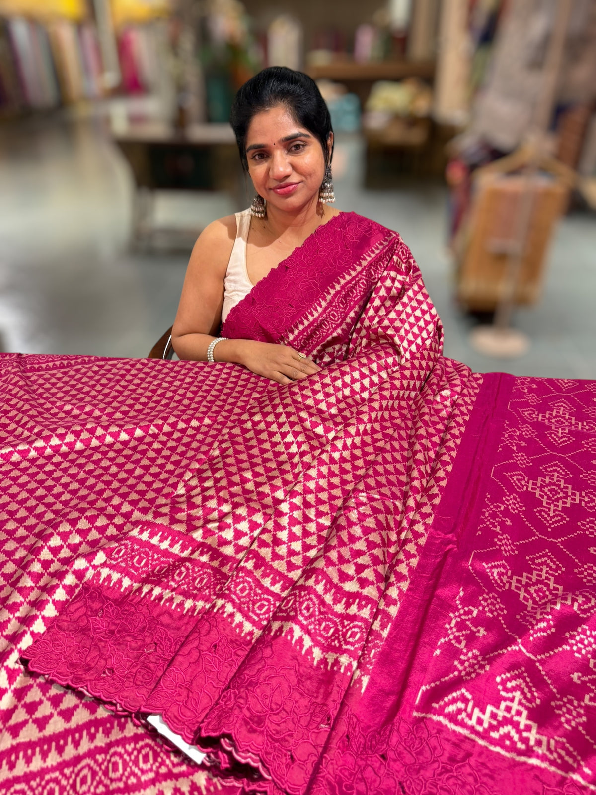 Ruby pink Cambodian–inspired Ikkat Silk Saree with cutwork Rose Border