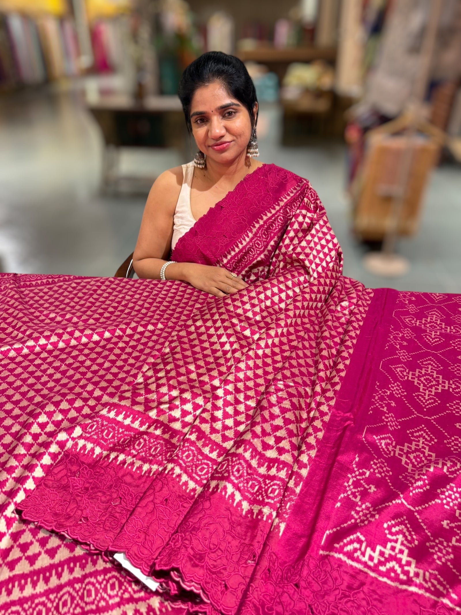 Ruby pink Cambodian–inspired Ikkat Silk Saree with cutwork Rose Border