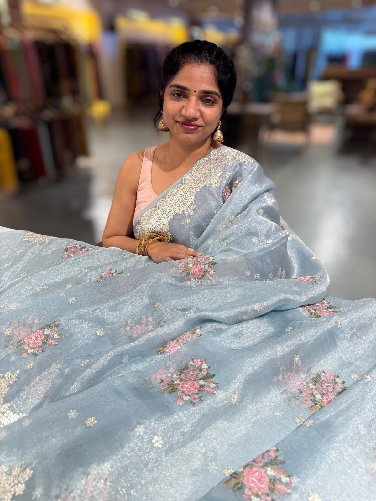 Pastel Blue Tissue Saree With allover Petite Point Motifs & Pittai Sequence Borders