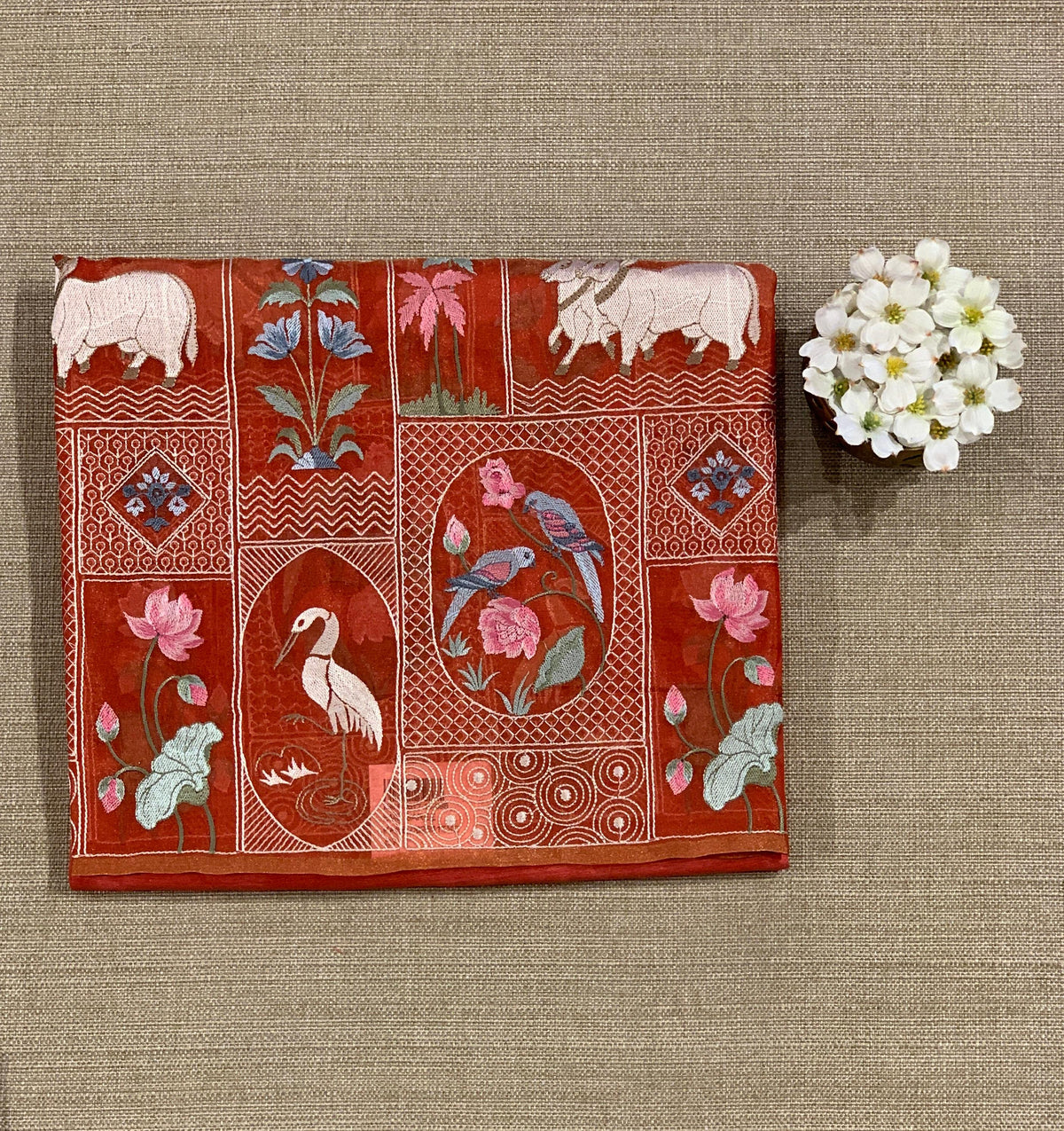 Reddish Orange Kora-Tussar blend Handloom Saree with Tissue embroidered Skirt Border