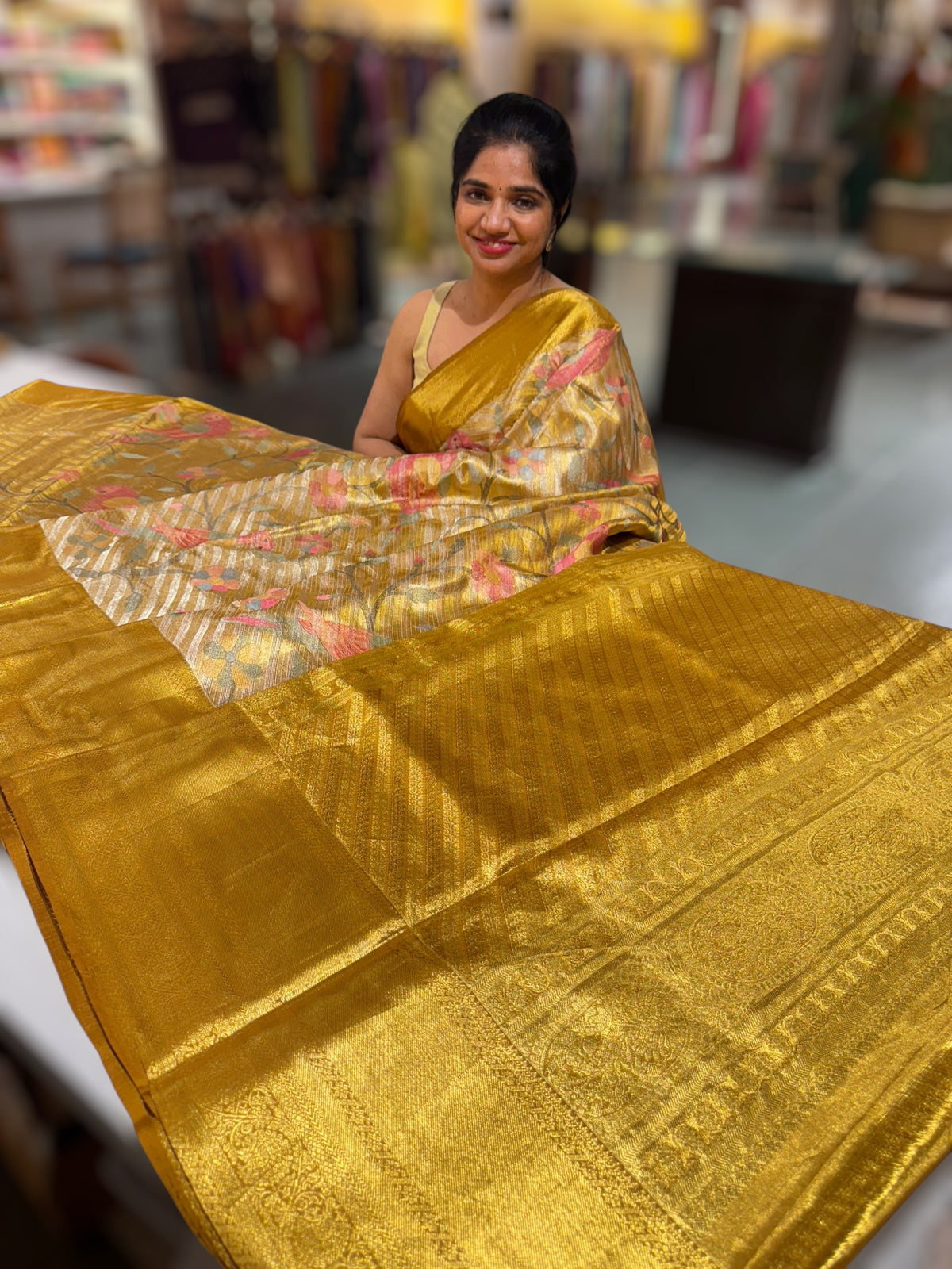 Molten Gold Kanjeevaram Tissue Saree with allover embroidery