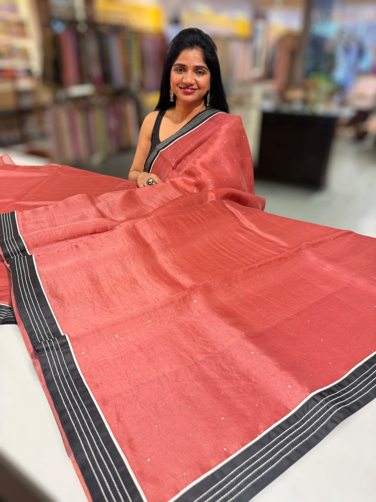 Rust Organza Saree with embroidered blouse