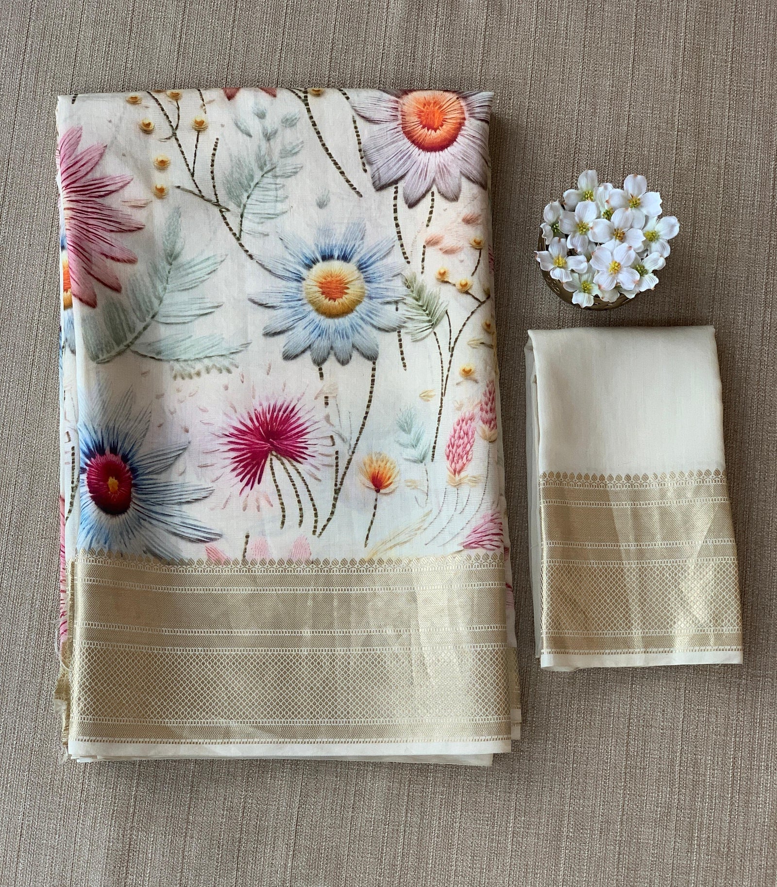 Ivory Pure Handloom Chiniya Silk Saree with stunning Floral Print and zari borders