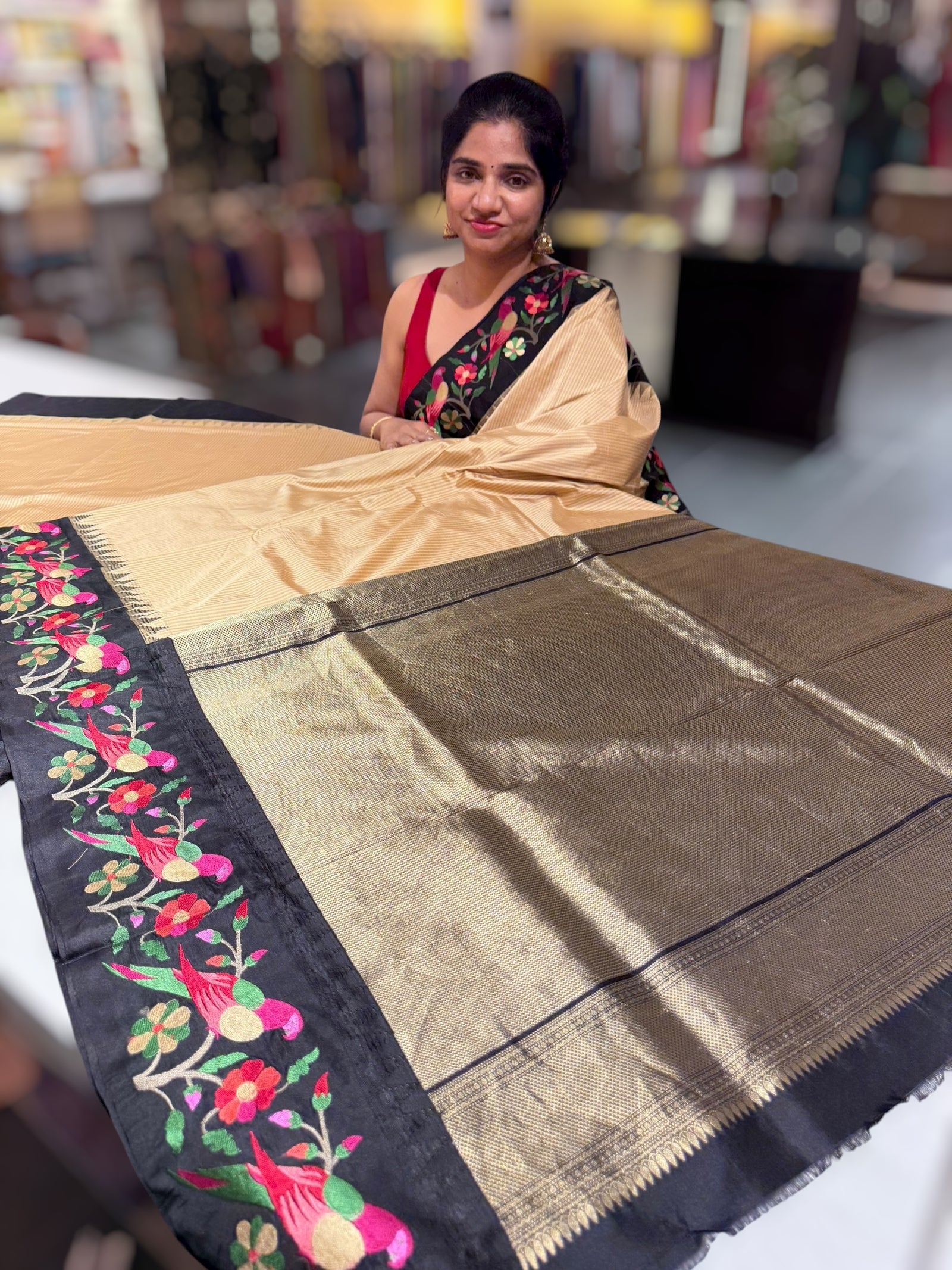 Beige kanchi vintage checks soft silk saree with pythani inspired parrot embroidered border