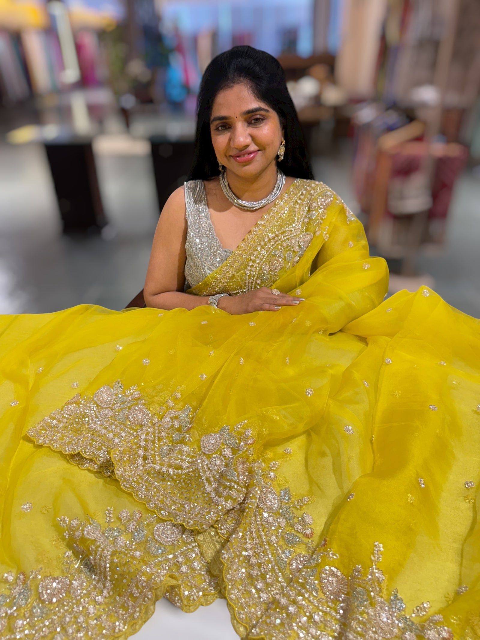 Lemon Yellow Organza Silk Saree with heavy intricate handwork