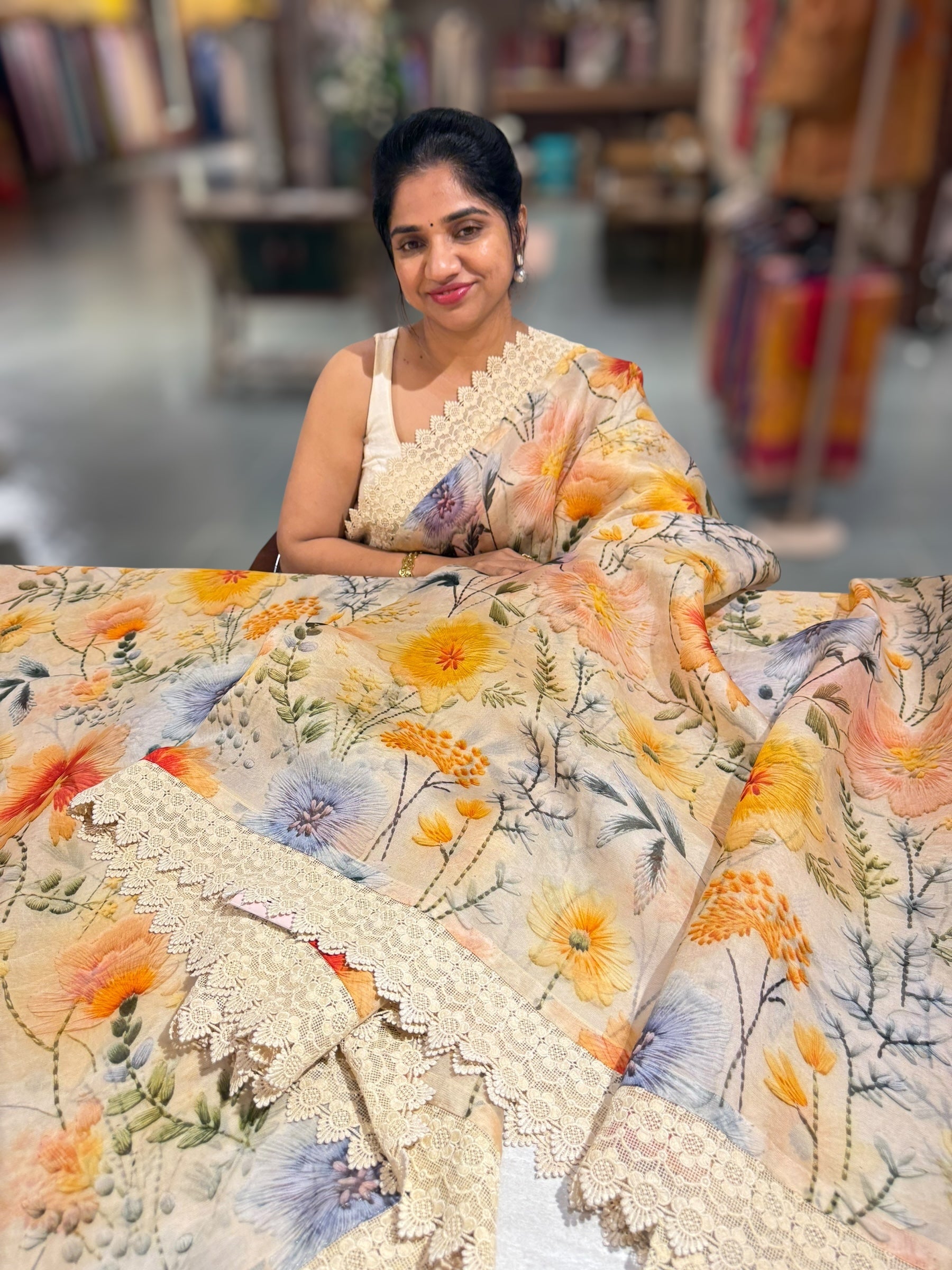 Beige Organza 3D floral Printed Saree hemlined with crotia lace
