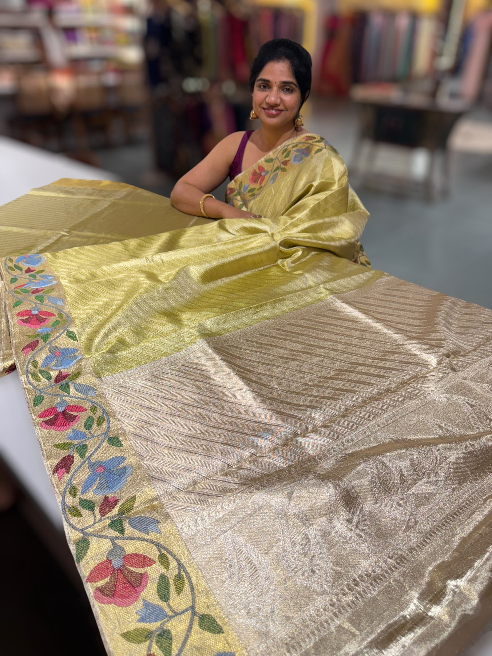 Apple Green Kanchi Tissue Brocade Saree With jamdani inspired embroidery.