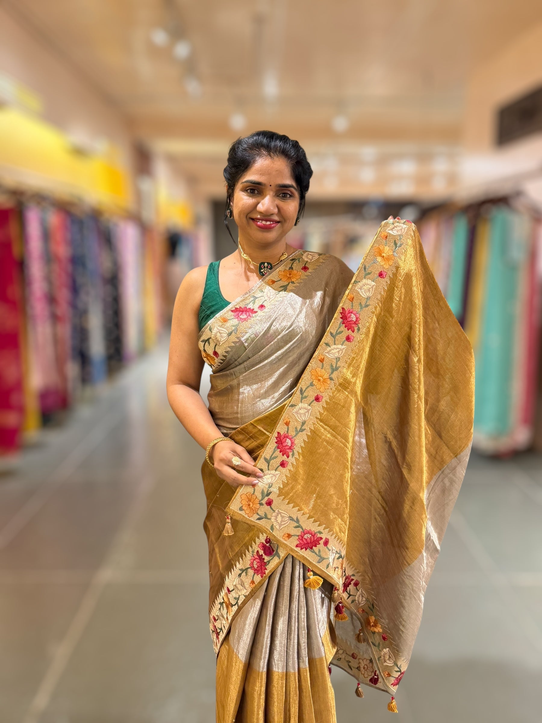 Handloom Tissue Saree with Paithani inspired embroidered border.