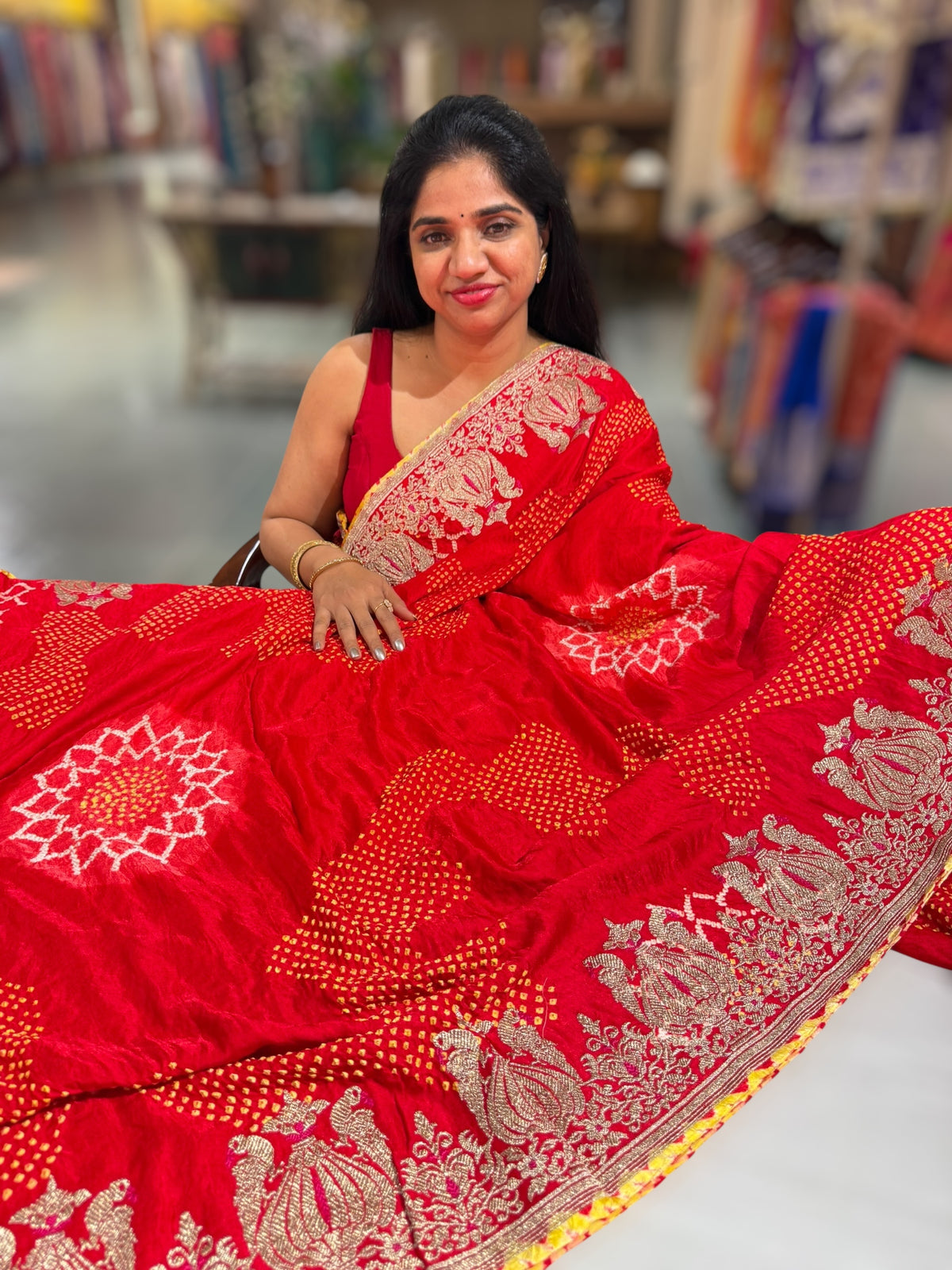 Orangish Red Designer Rai Bandhej Saree With Embroidered Border