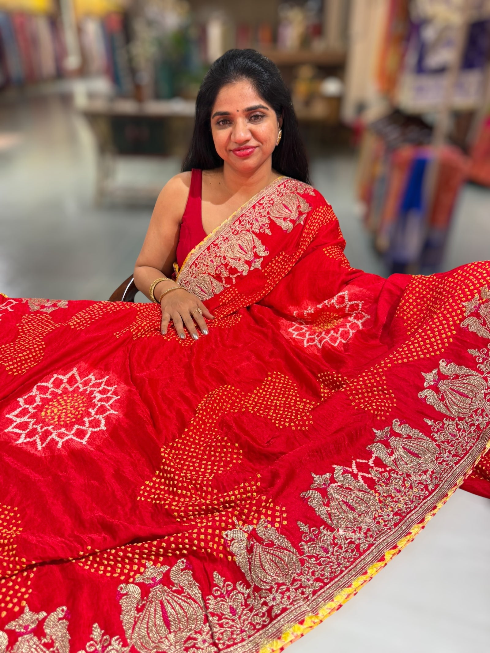 Orangish Red Designer Rai Bandhej Saree With Embroidered Border