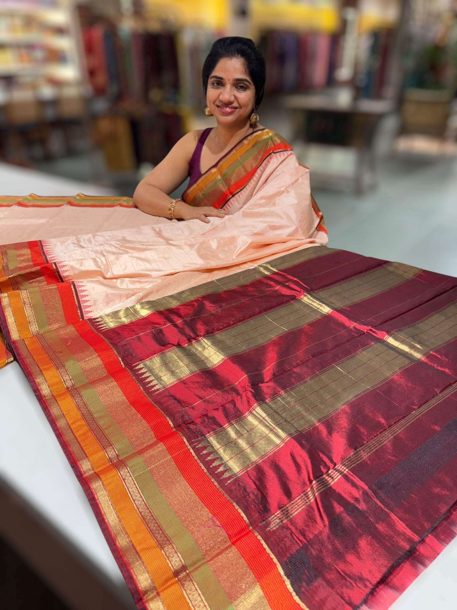 Peach Pink Kanchi vintage style soft silk saree with zari checks & multi color border.
