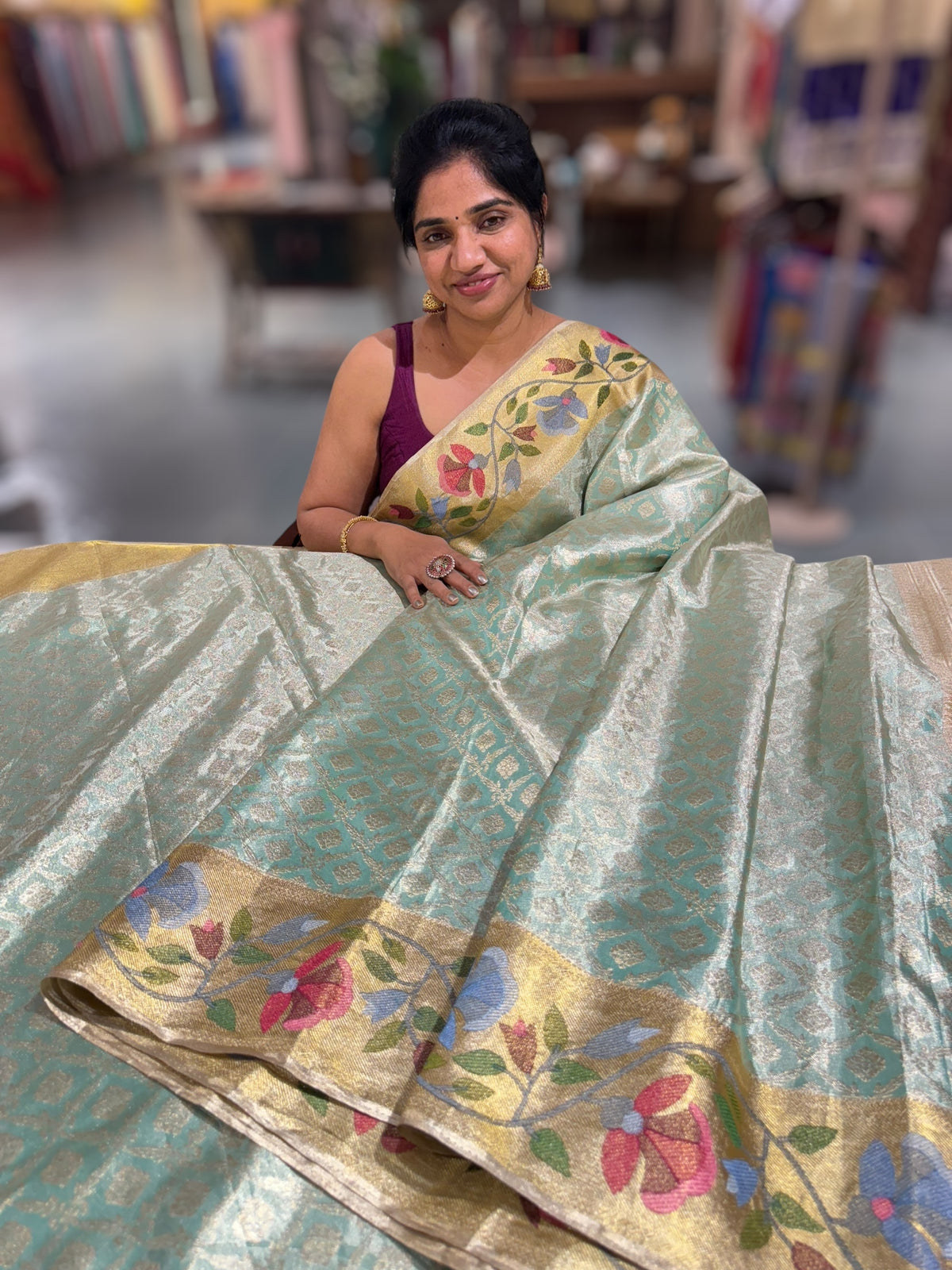 Sea Green Kanchi Tissue Brocade Saree With jamdani inspired embroidery.