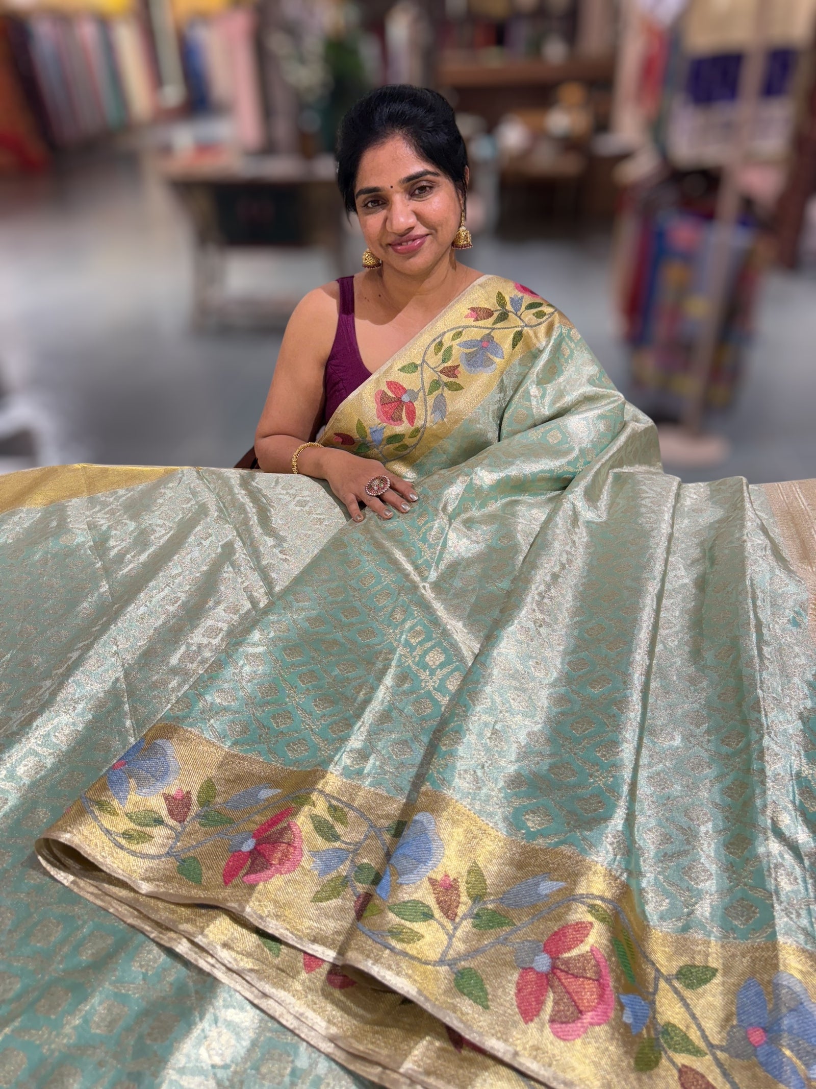 Sea Green Kanchi Tissue Brocade Saree With jamdani inspired embroidery.