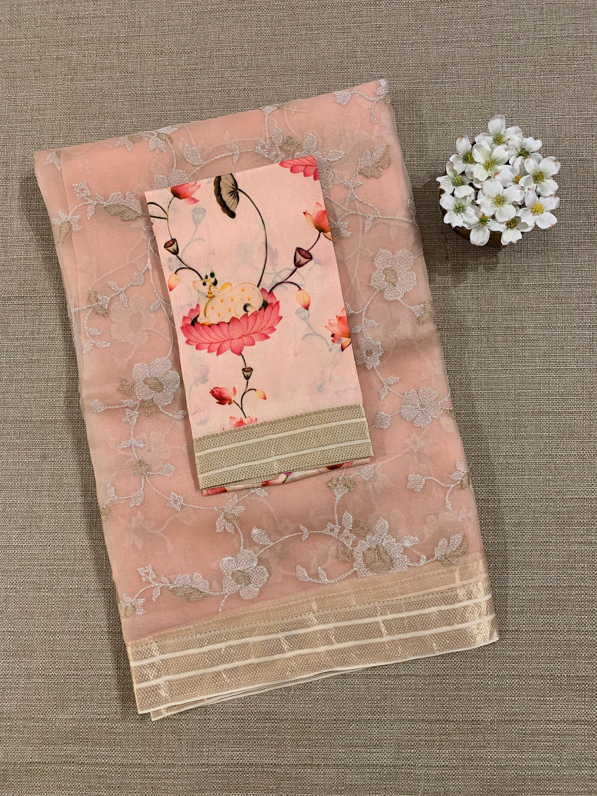 Peach Muslin allover embroidered Saree with pichwai printed blosue